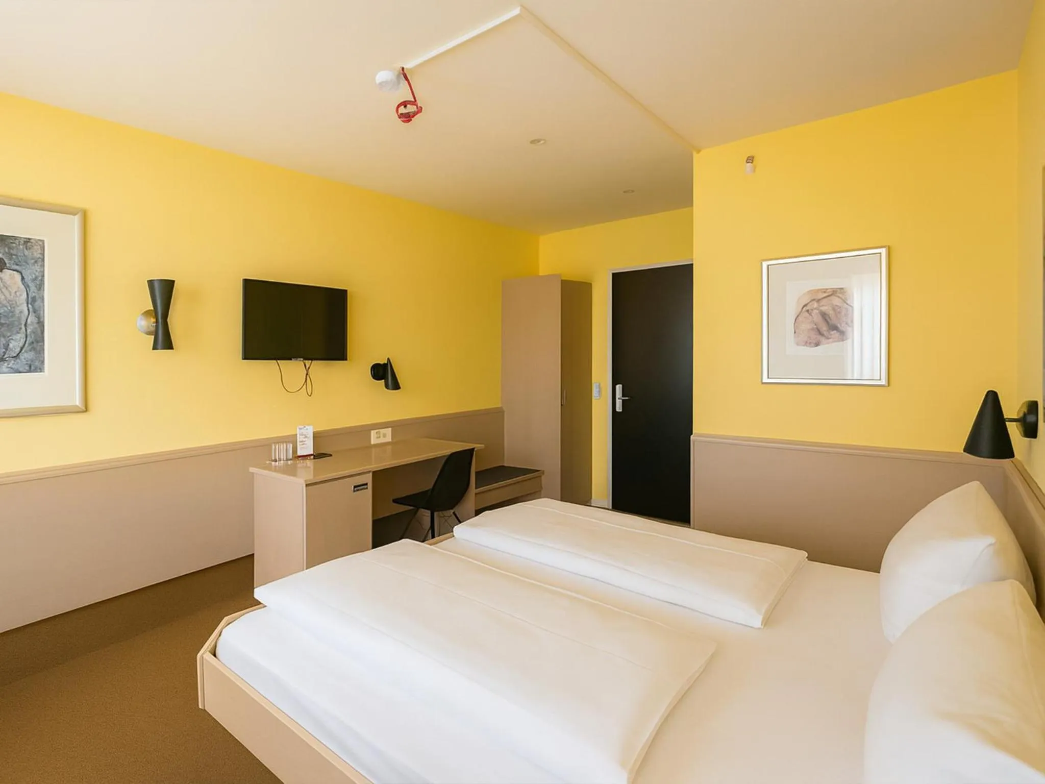 Photo of the whole room, Bed in DORMERO Hotel Schwäbisch Hall