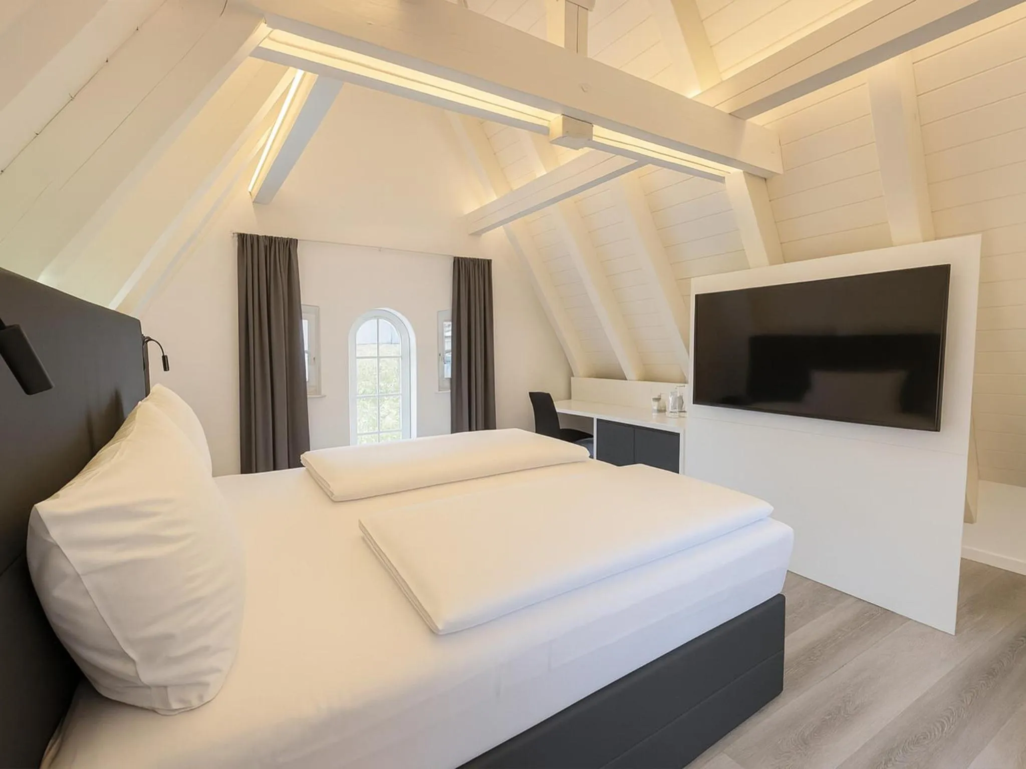 Photo of the whole room, Bed in DORMERO Hotel Schwäbisch Hall