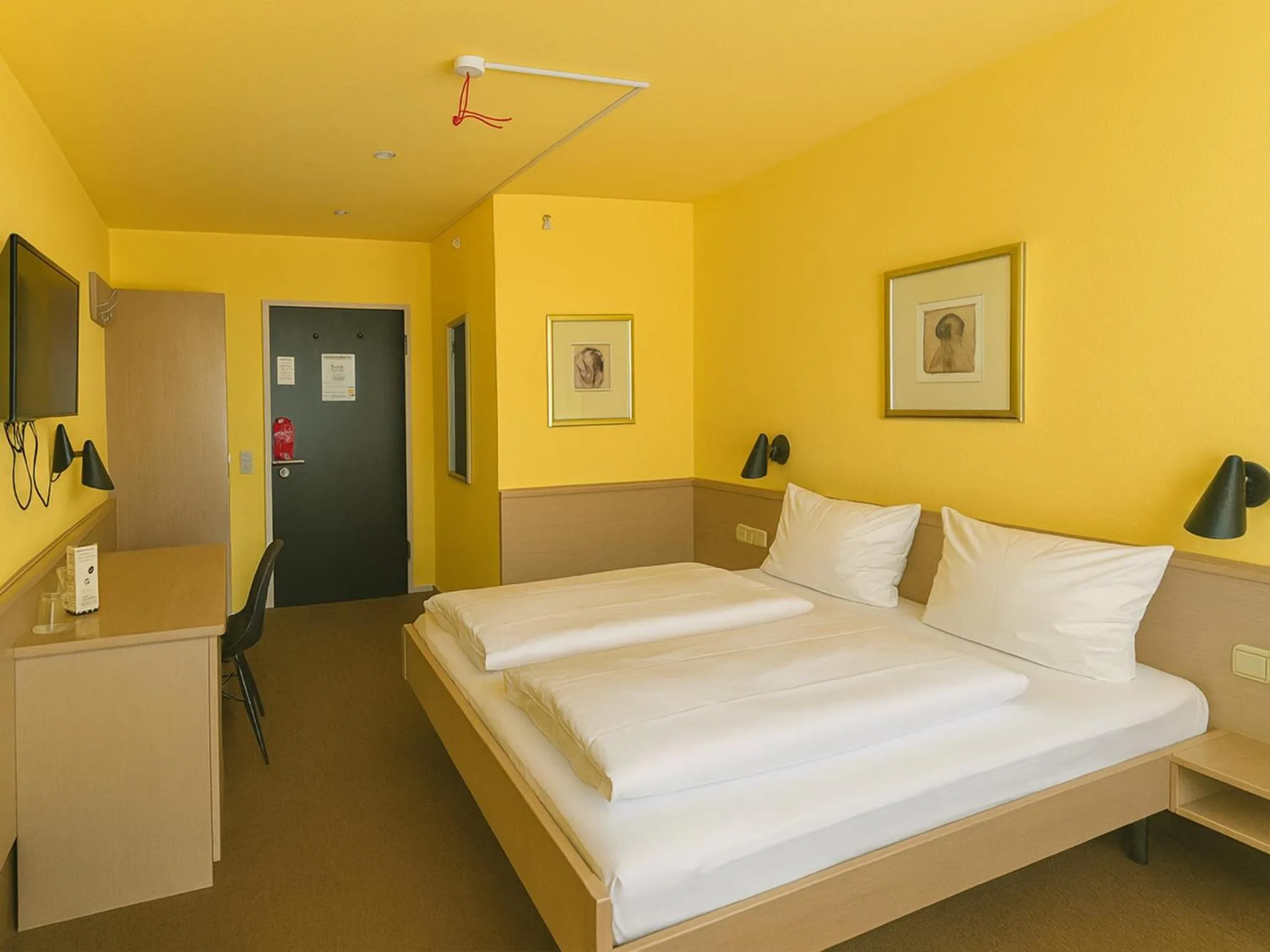 Photo of the whole room, Bed in DORMERO Hotel Schwäbisch Hall