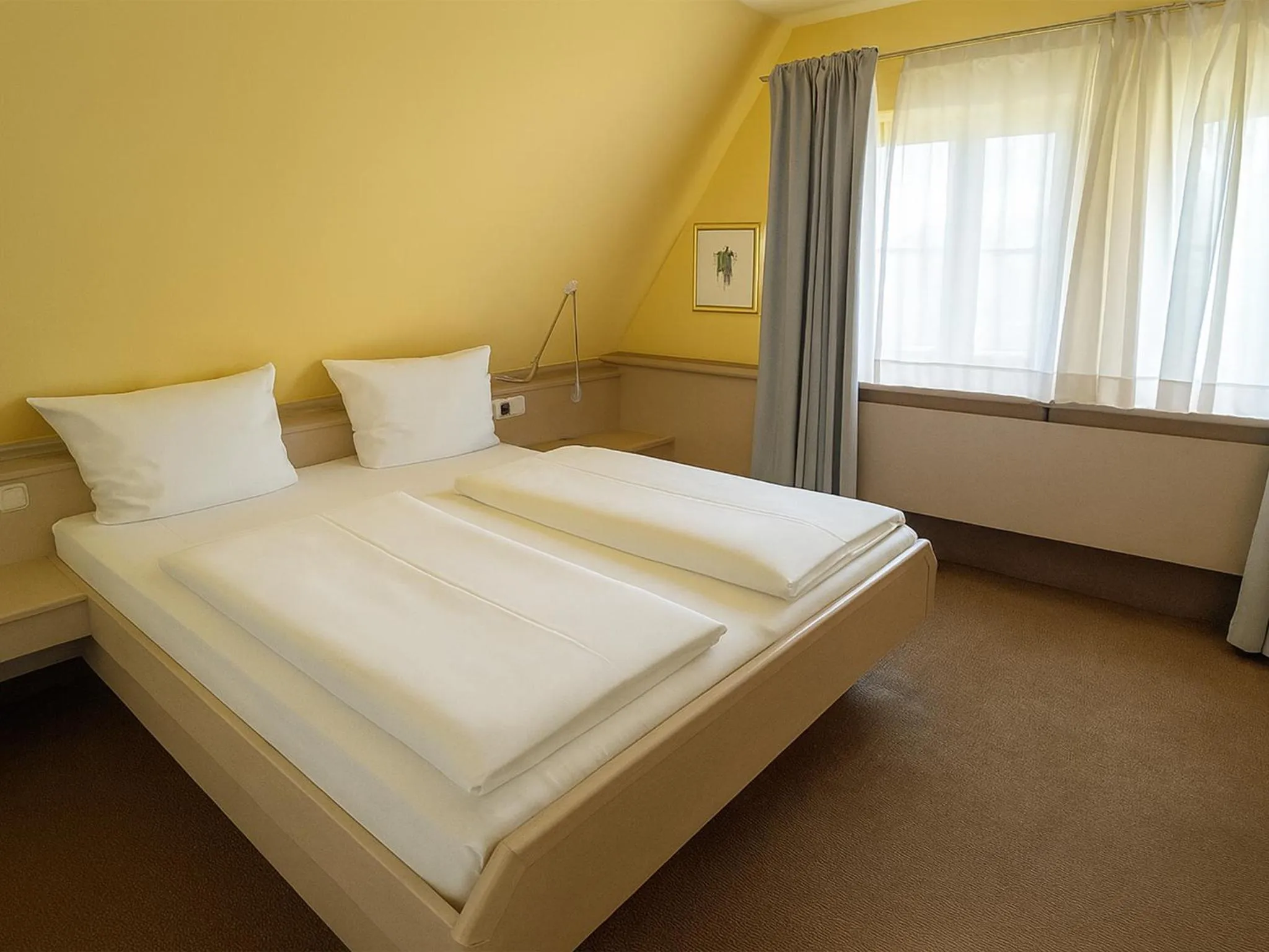 Photo of the whole room, Bed in DORMERO Hotel Schwäbisch Hall