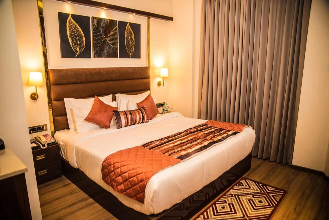 Bed in Regenta Inn Amristar Airport Road by Royal Orchid Hotels Limited