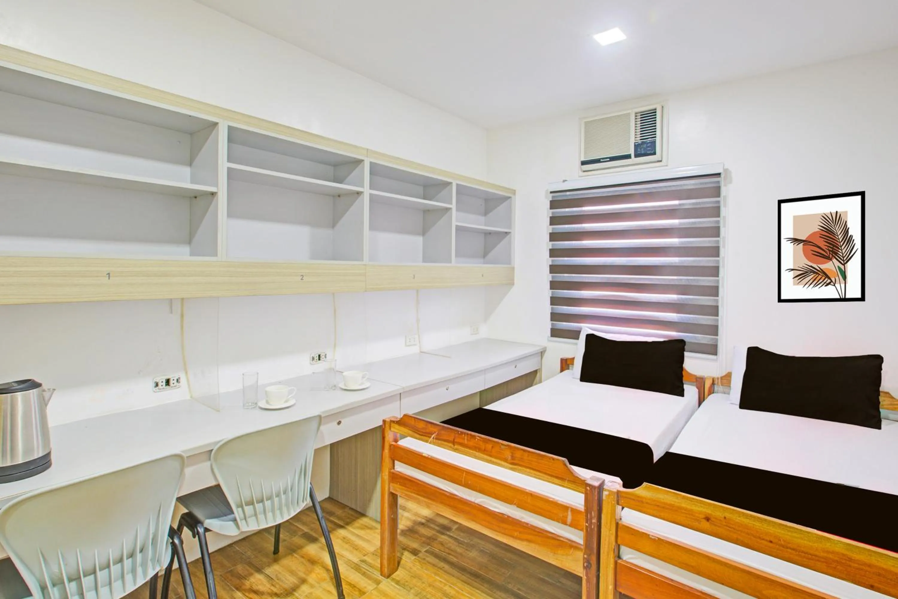 Photo of the whole room in Collection O Metro Manila near University Belt formerly 1318 Residences