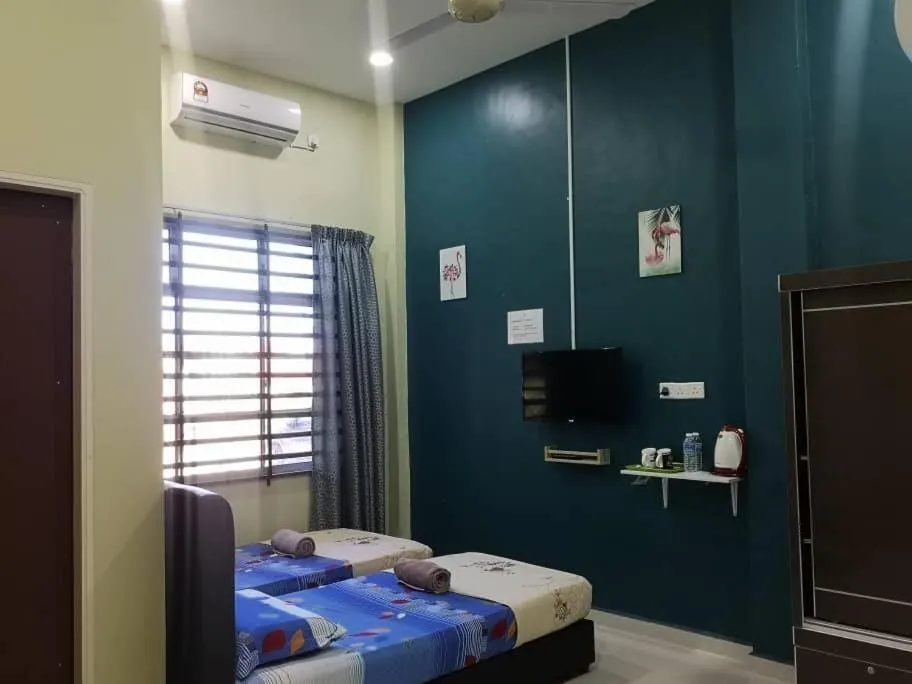 Bed in VILLA SENTOSA