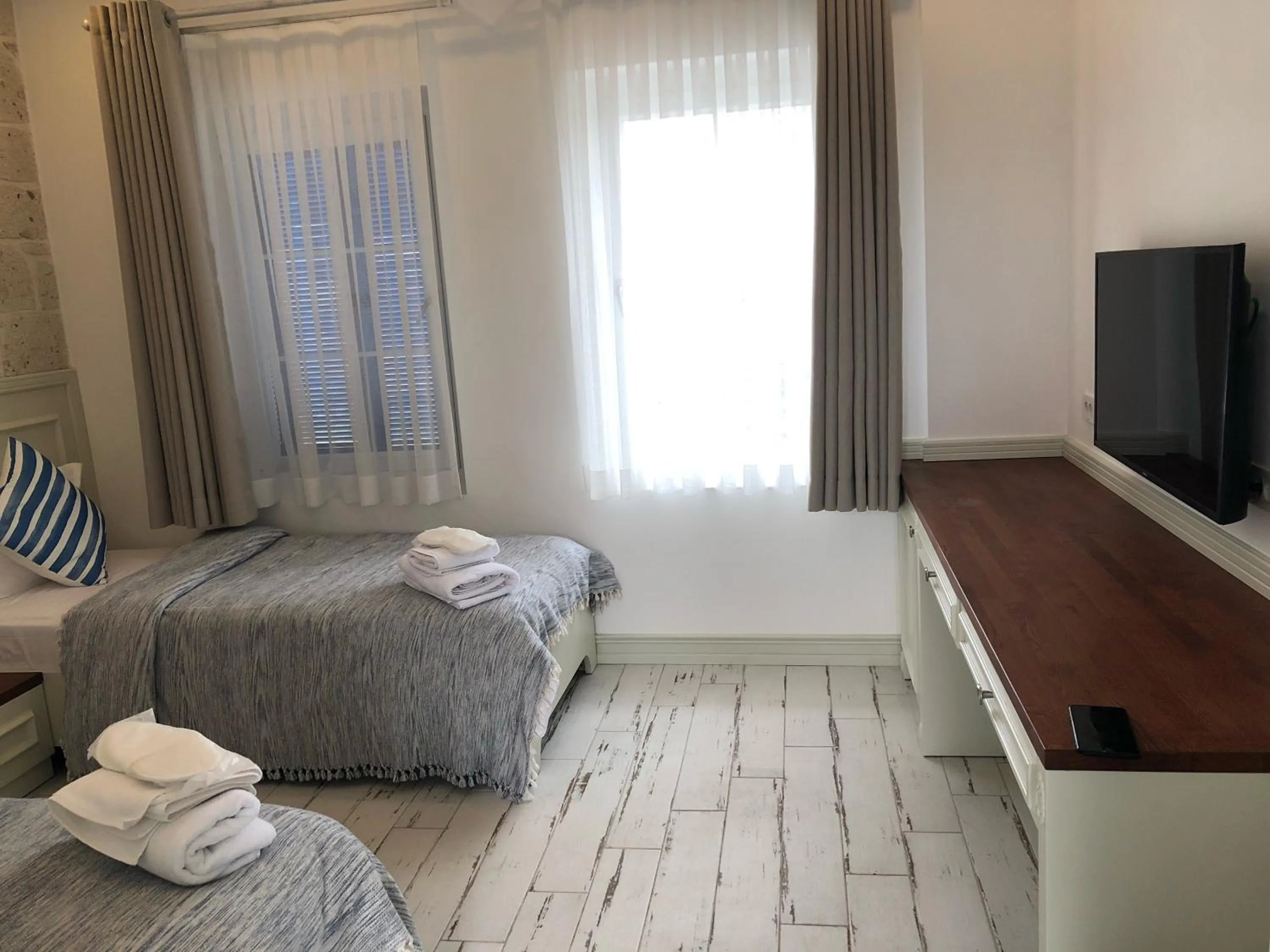 Photo of the whole room, Bed in Rhodium Hotel Alaçatı