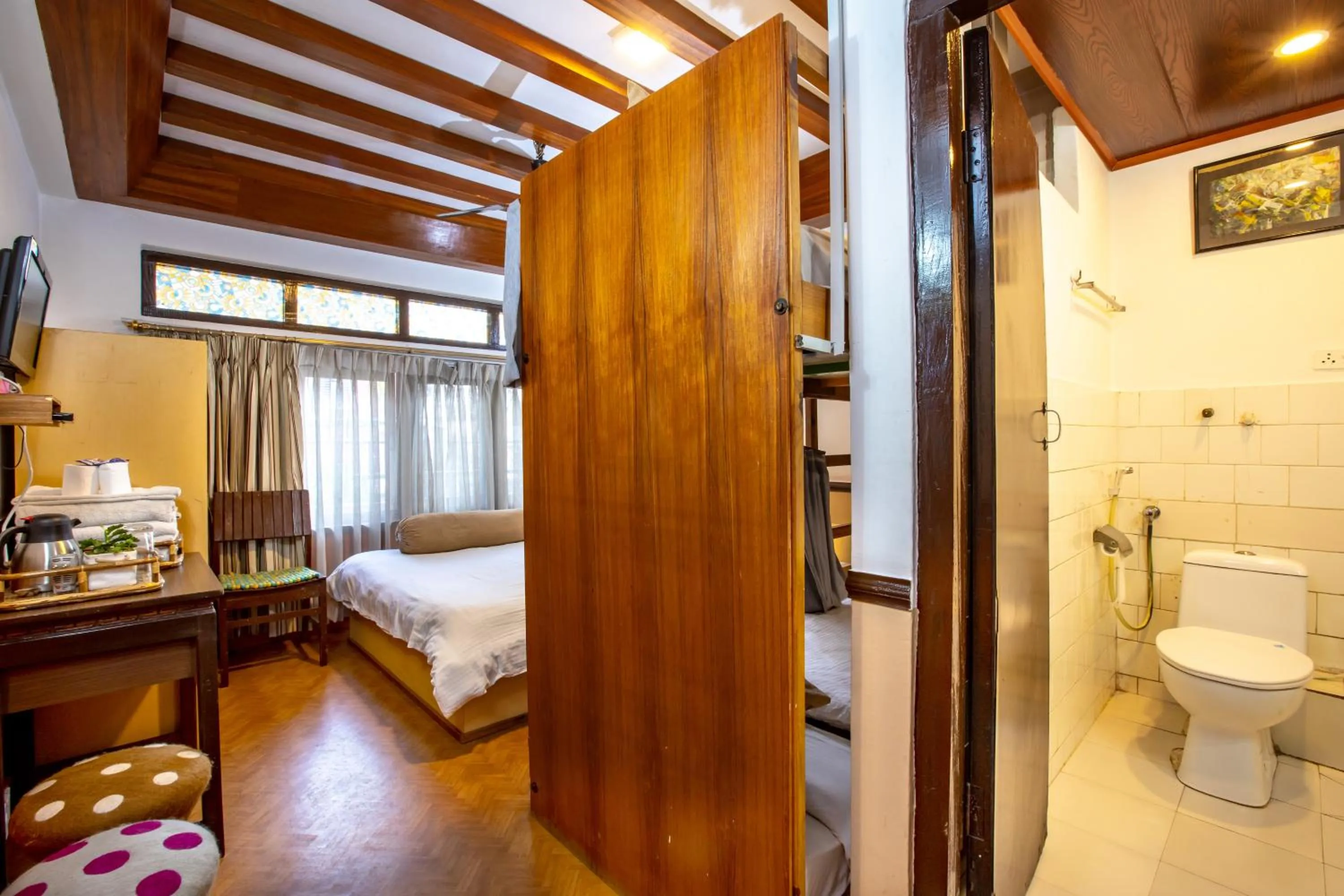 Photo of the whole room, Bed in Shangrila Boutique Hotel