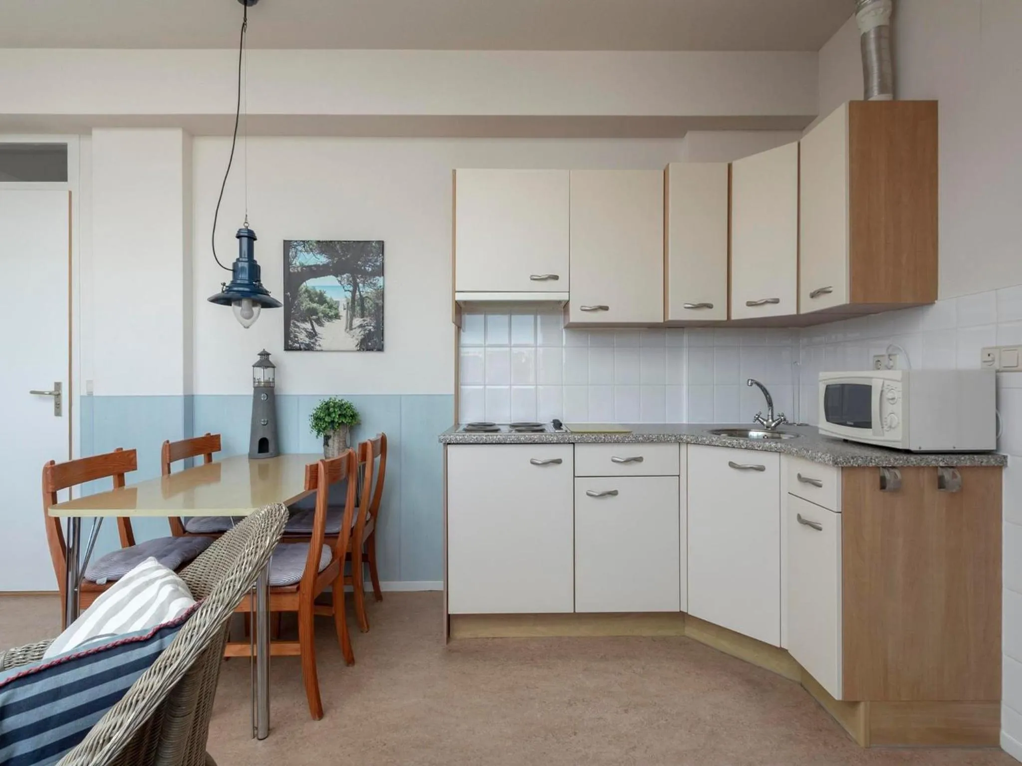 Kitchen or kitchenette in Dorpsplein 23E apartment in Callanstoog square