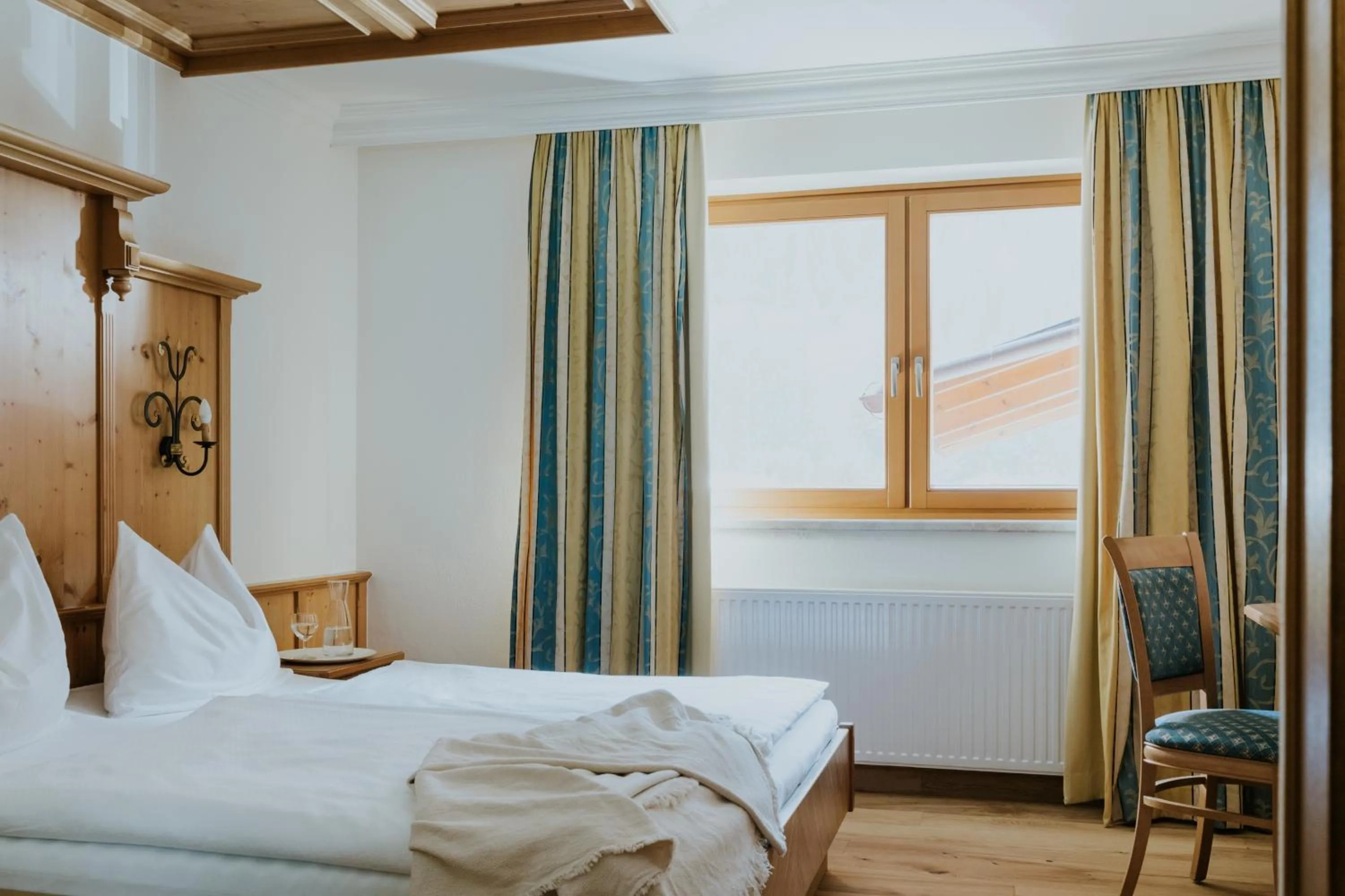 Bed in Hotel Tauernhof