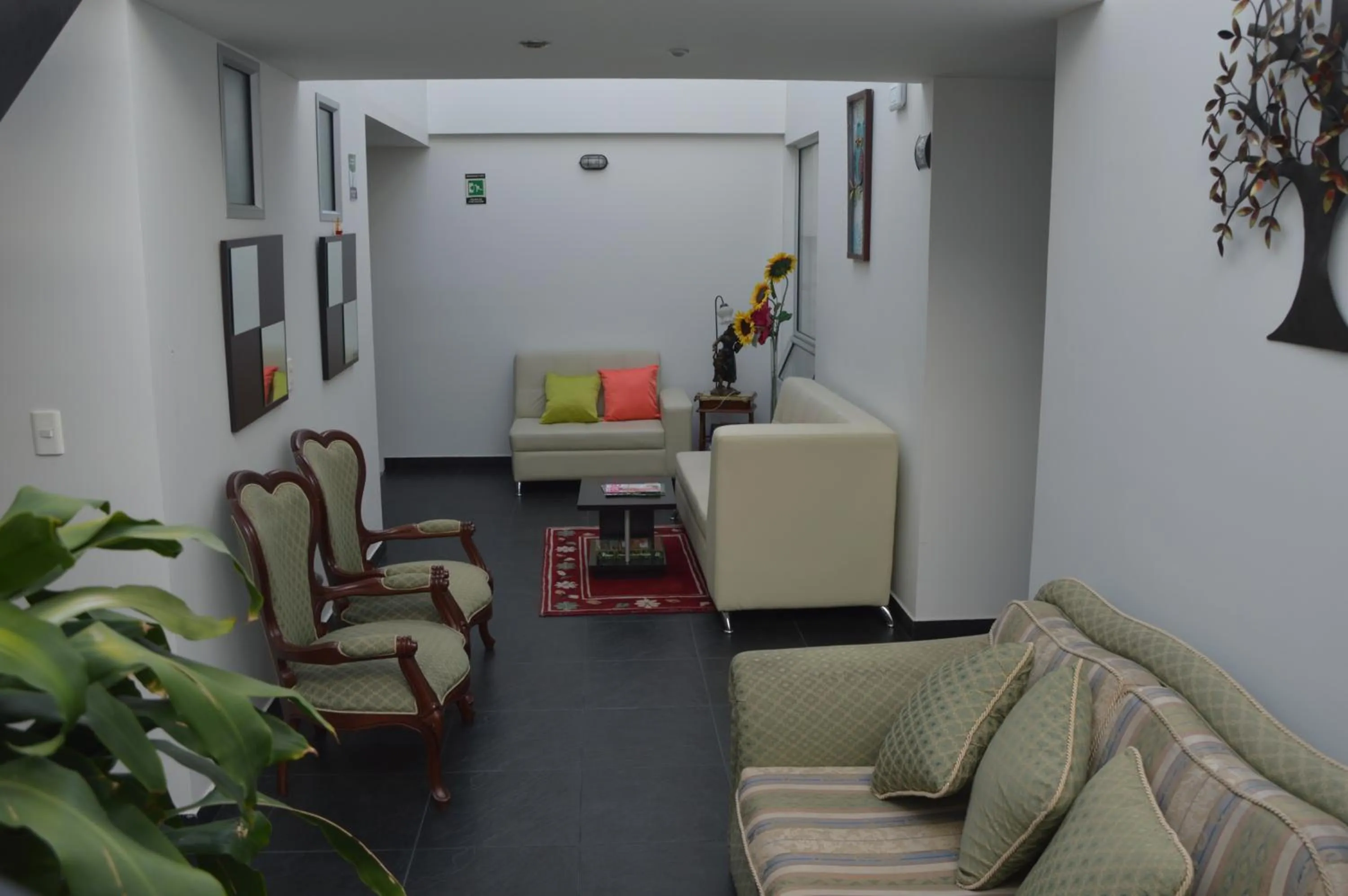 Communal lounge/ TV room in Hotel Parque Santander Tunja