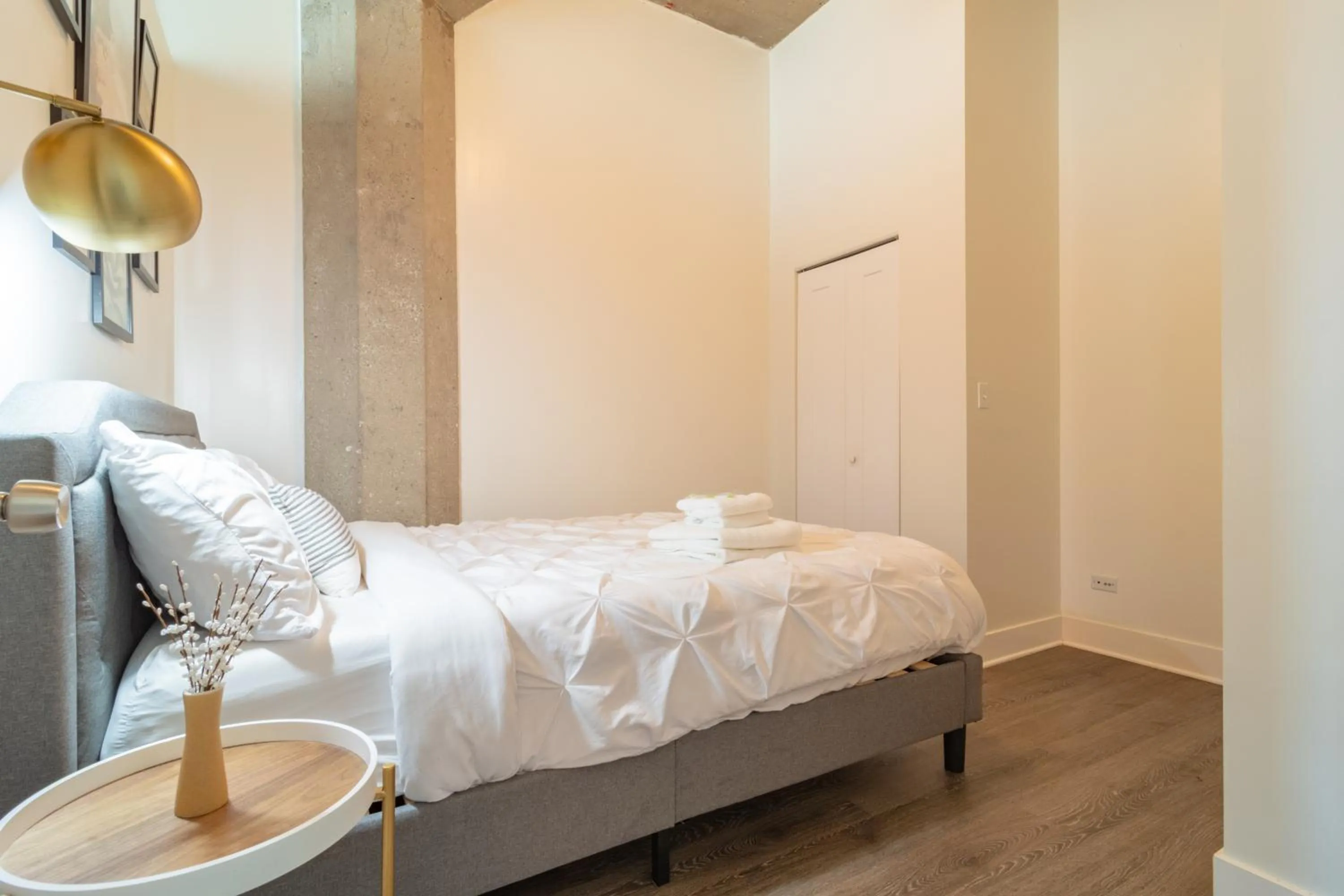 Bed in Convenient 2BR Suite in Prime Location with Gym Access & Optional Parking Near McCormick Place and Soldier Field