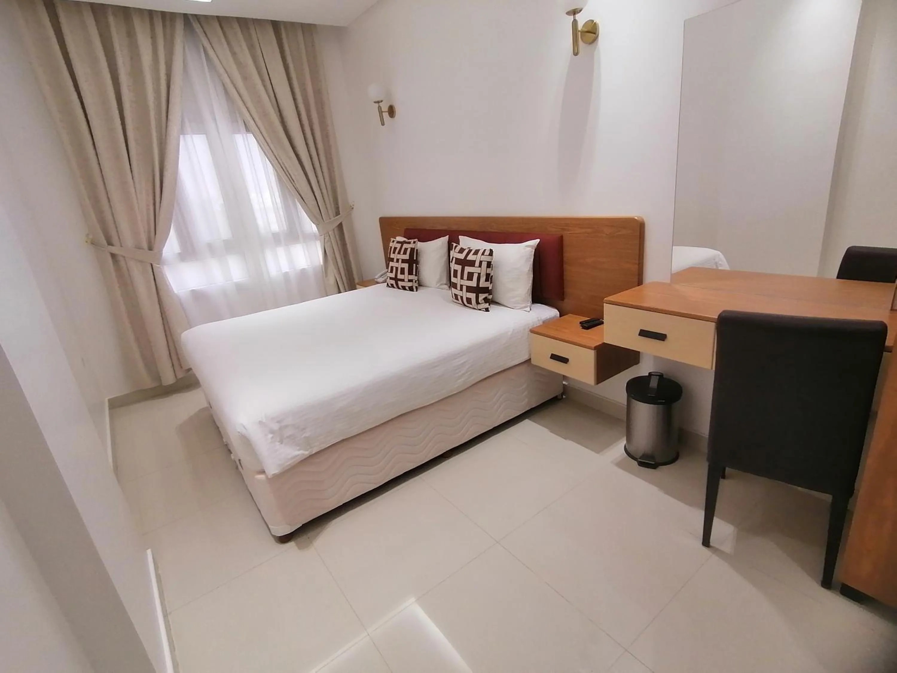 View (from property/room), Bed in Nizwa Hotel Apartments