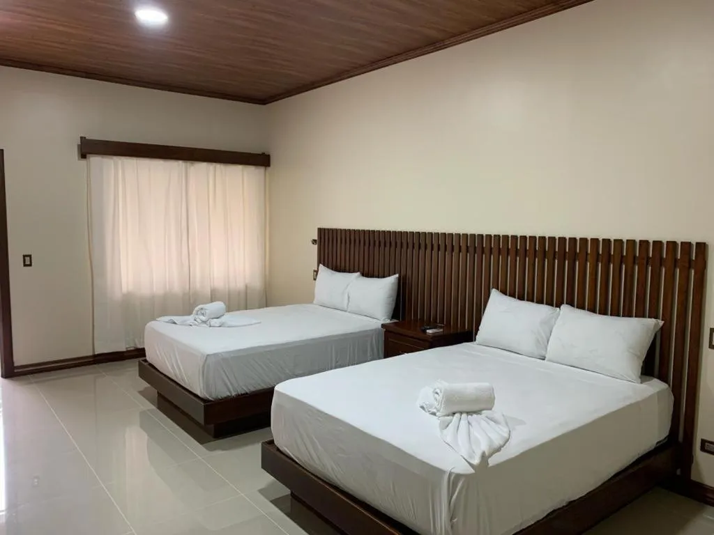 Photo of the whole room, Bed in Orquideas Boutique Hotel