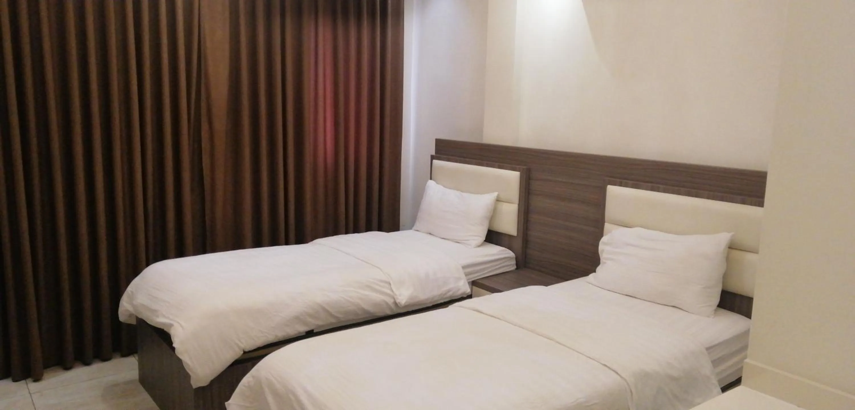 Bed in Seven Days Hotel