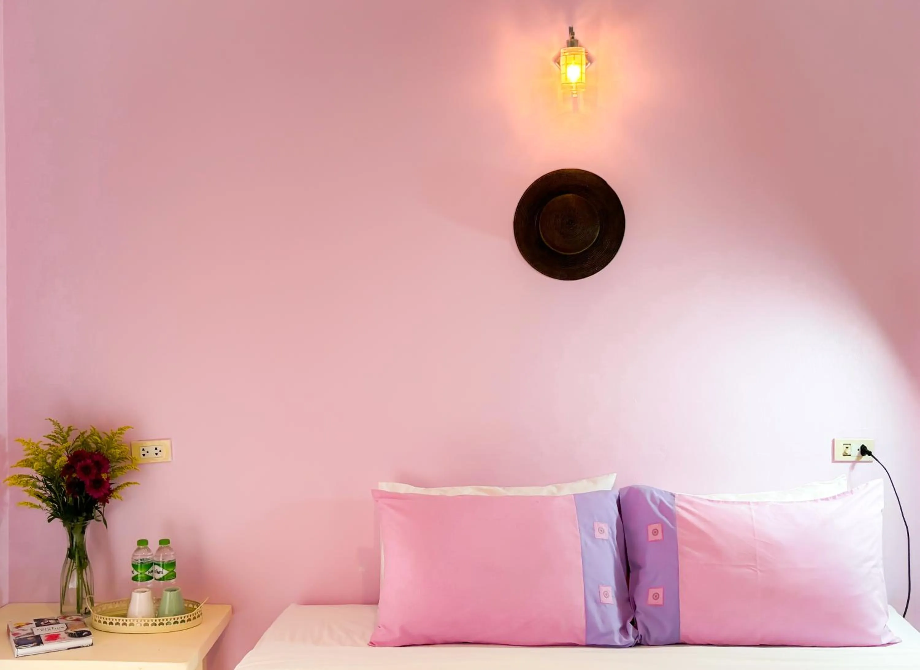 Bed in Les Fleurs House