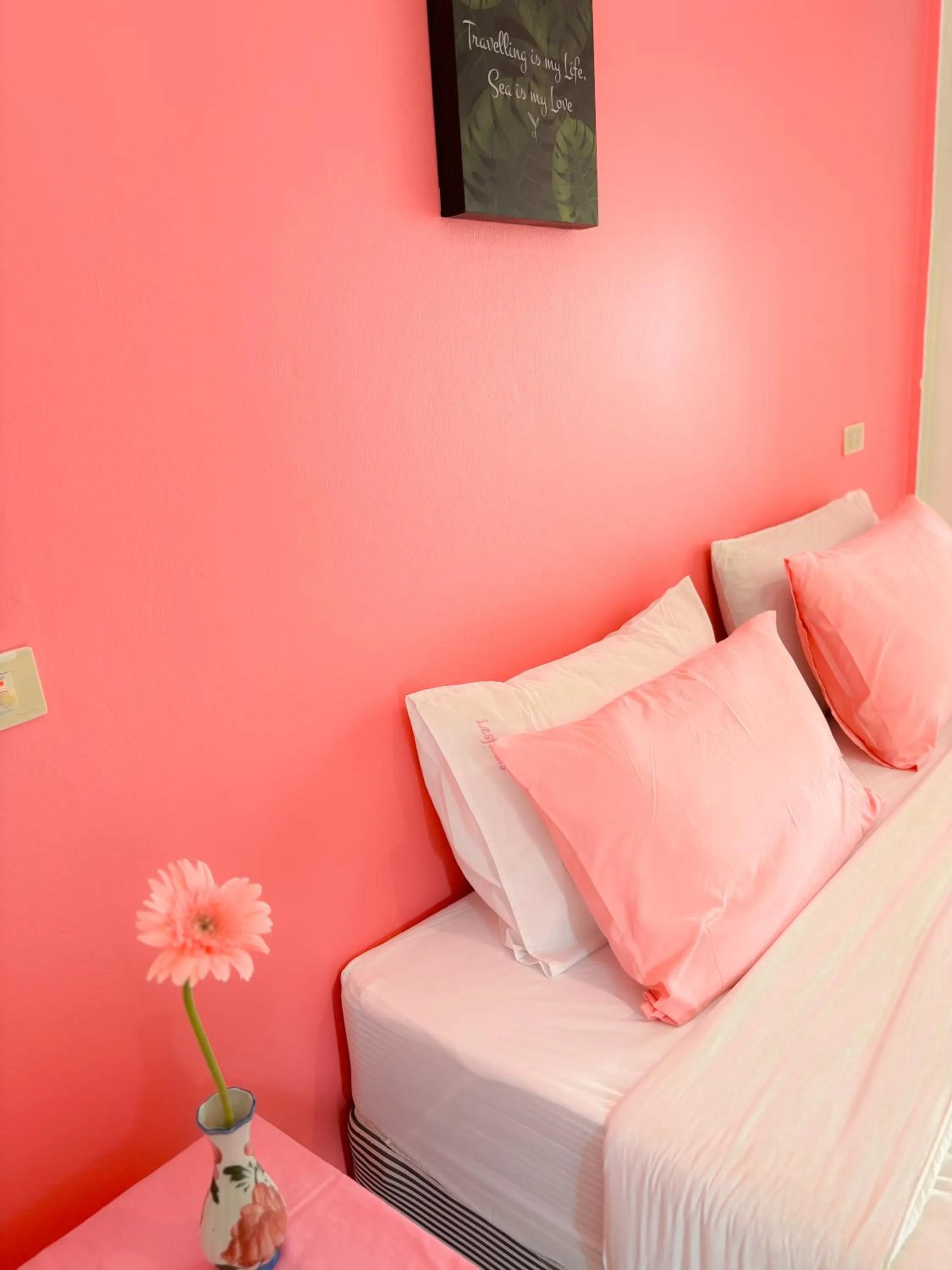 Bed in Les Fleurs House