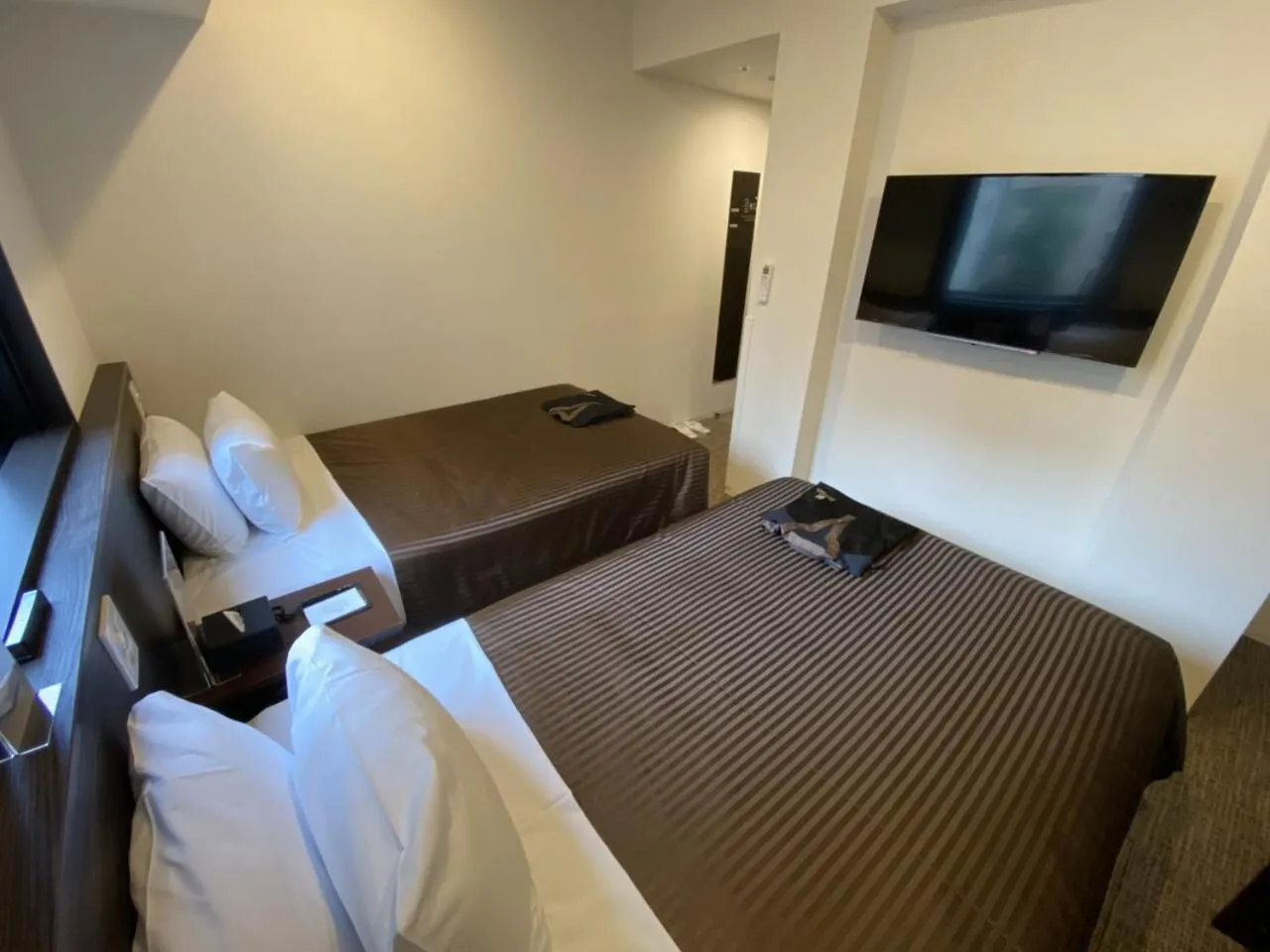 Bed in HOTEL LiVEMAX PREMIUM Nagoya Marunouchi
