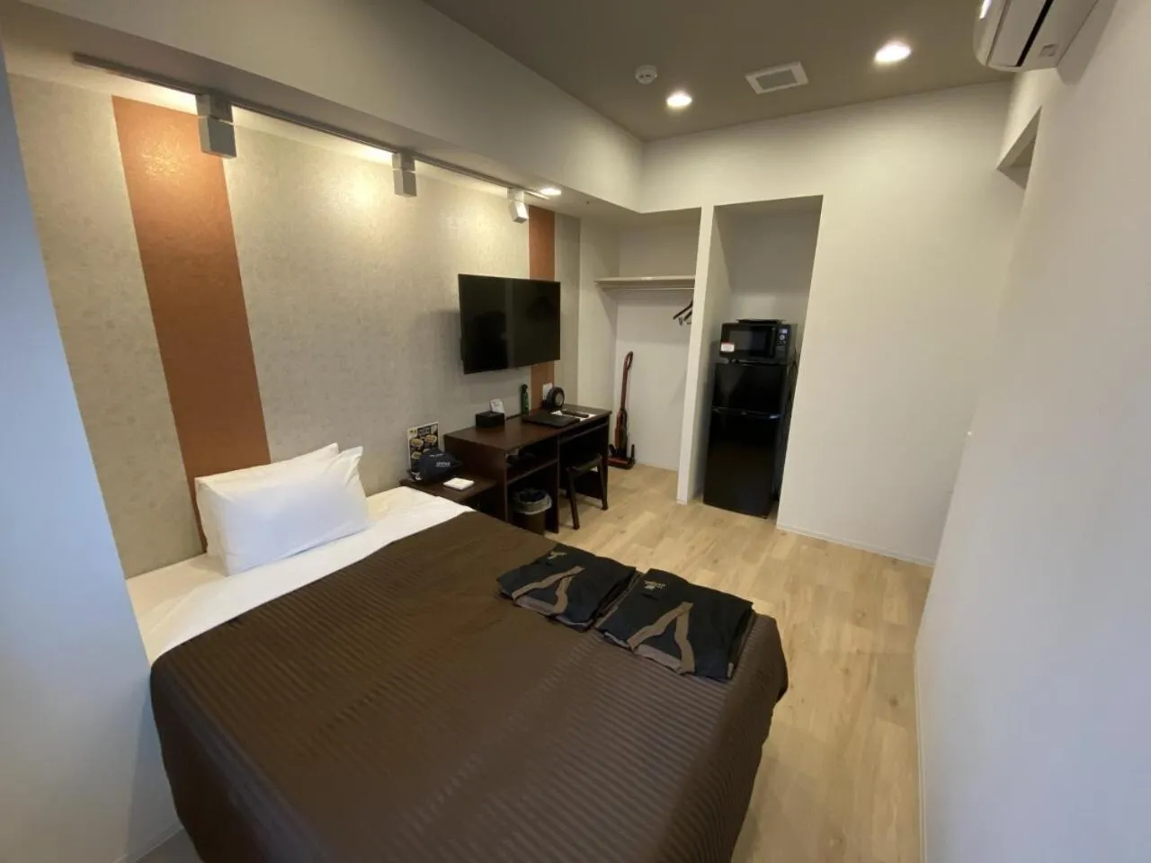 Kitchen or kitchenette, Bed in HOTEL LiVEMAX PREMIUM Nagoya Marunouchi