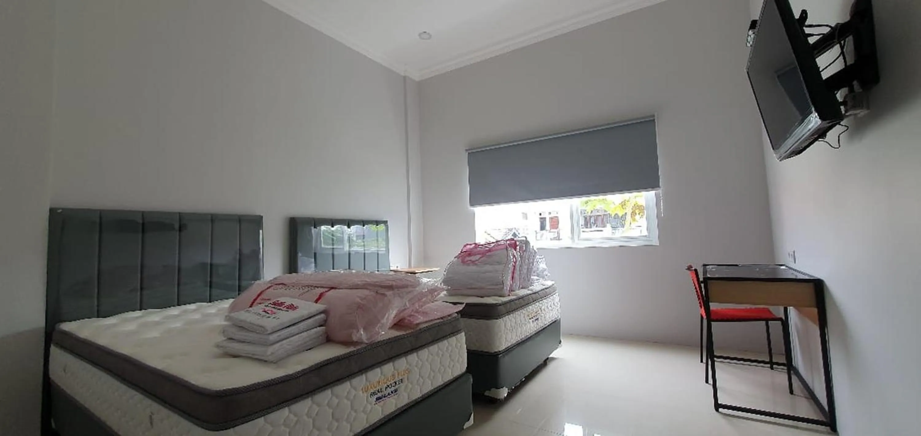 Bed in RedDoorz Plus near Siloam Hospital Balikpapan