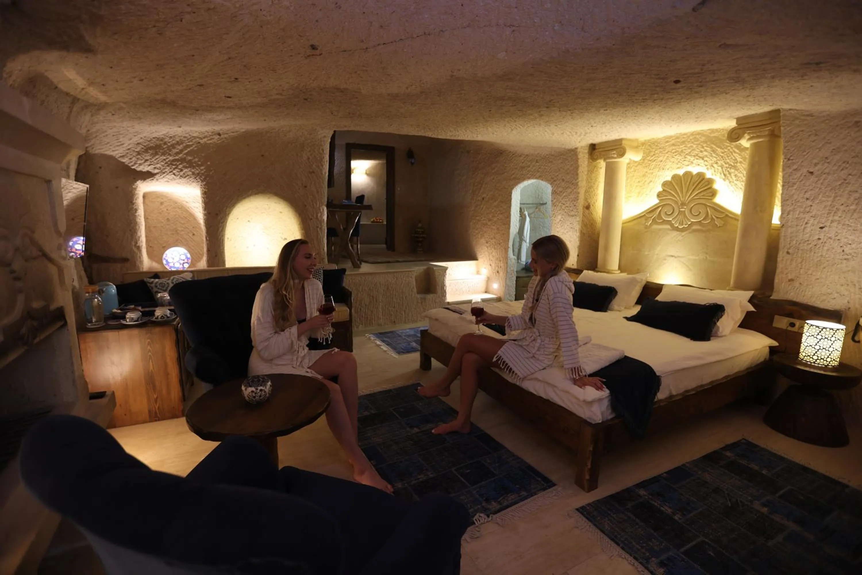 People in Mak's Cave House