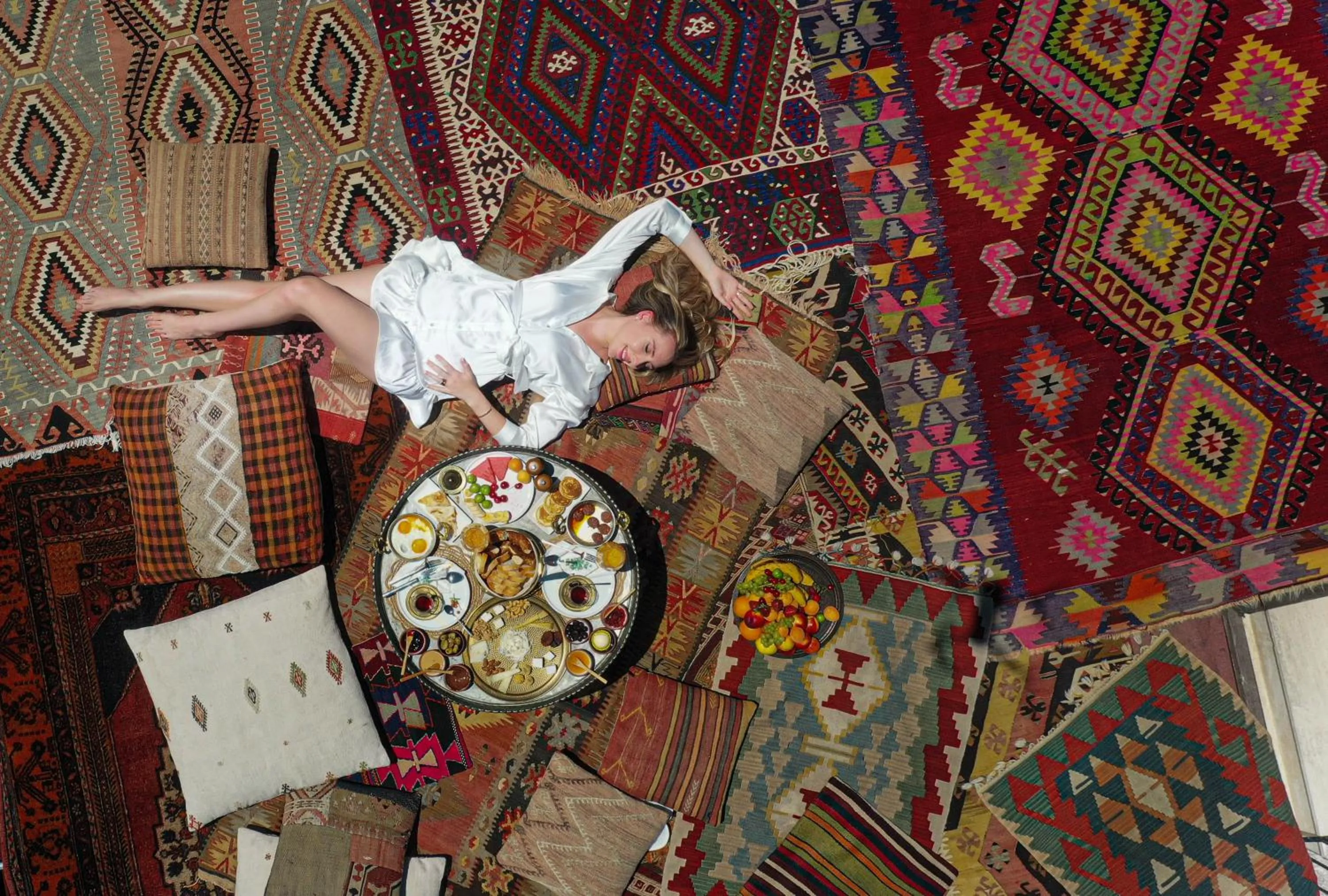 People in Mak's Cave House