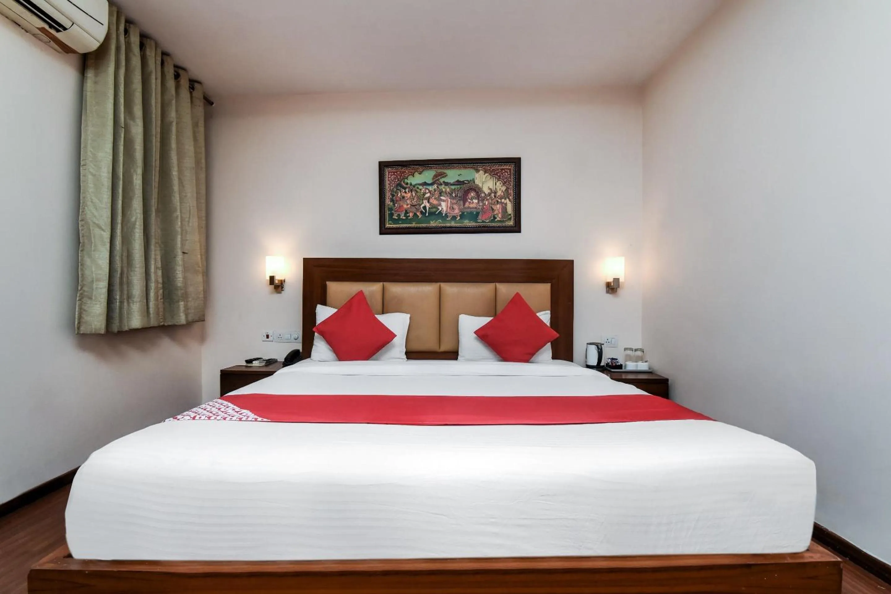 Bedroom in Capital O Corporate Inn