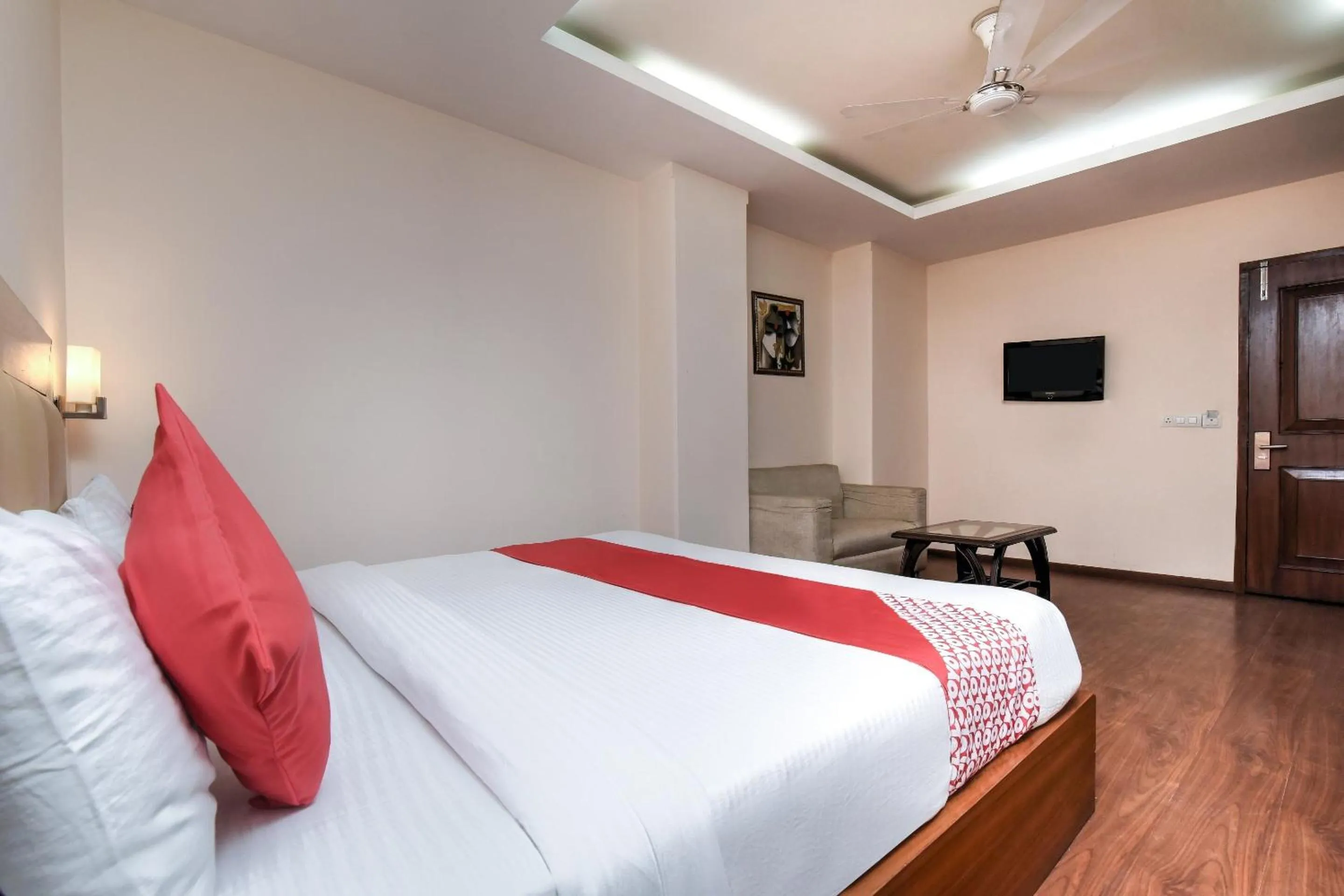 Bedroom in Capital O Corporate Inn