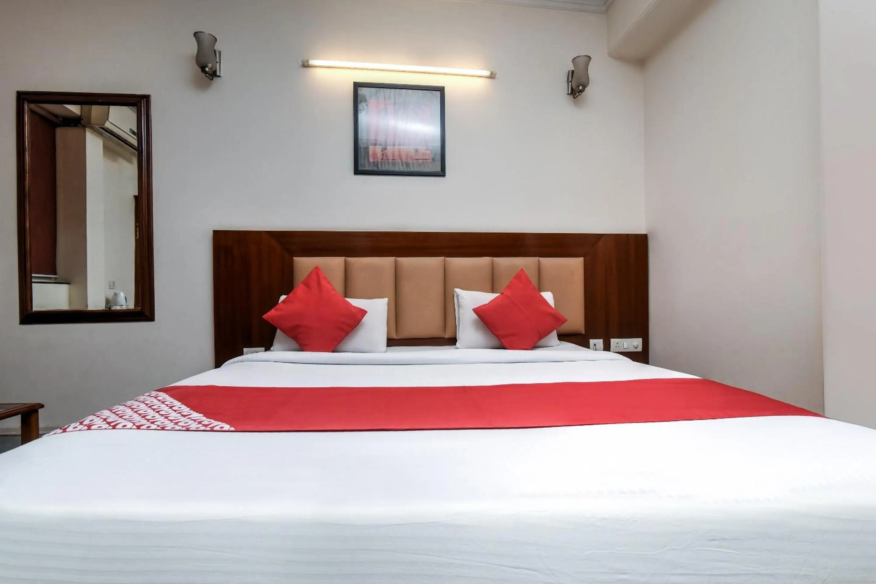 Bedroom, Bed in Capital O Corporate Inn