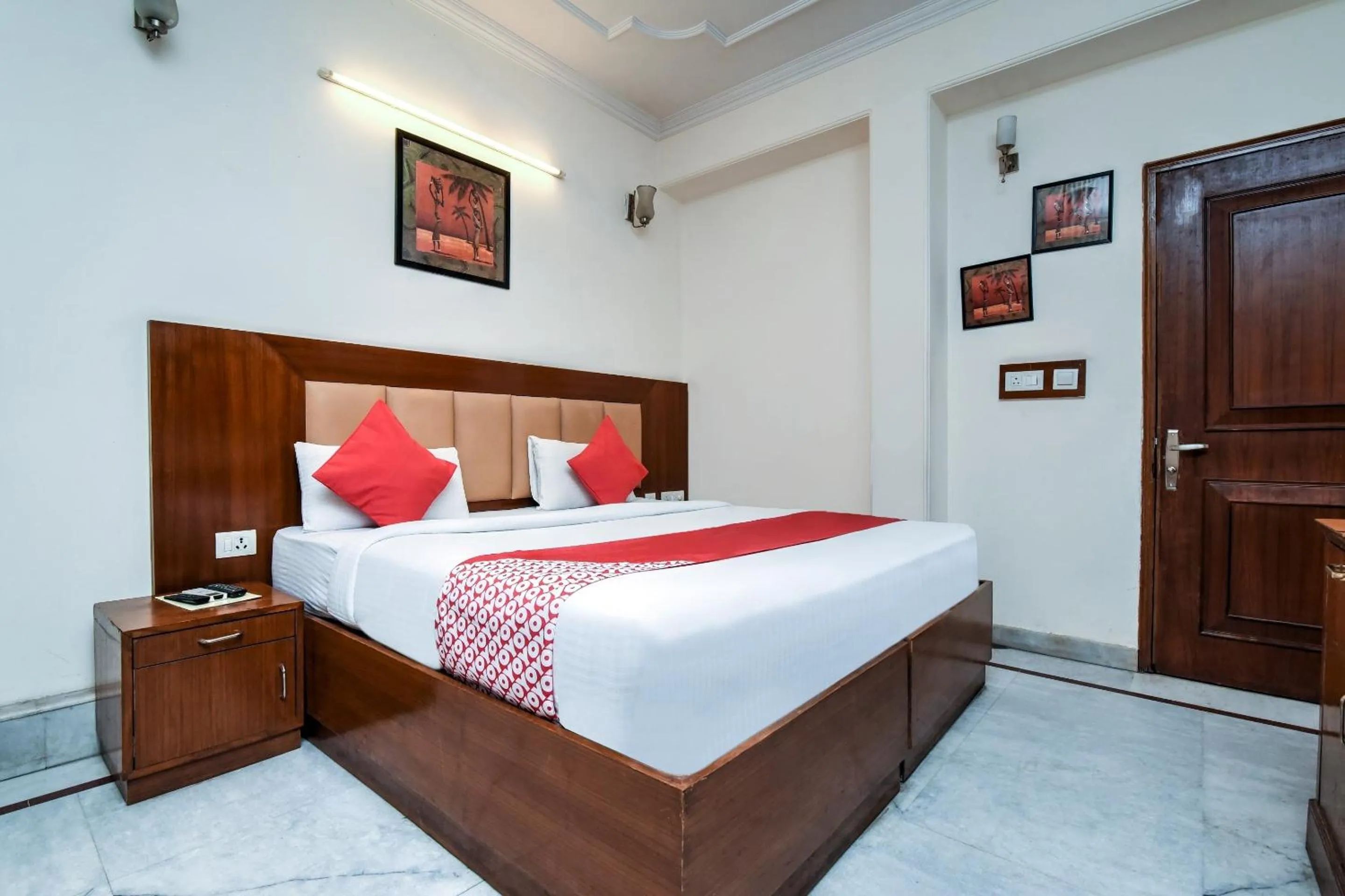 Bedroom in Capital O Corporate Inn