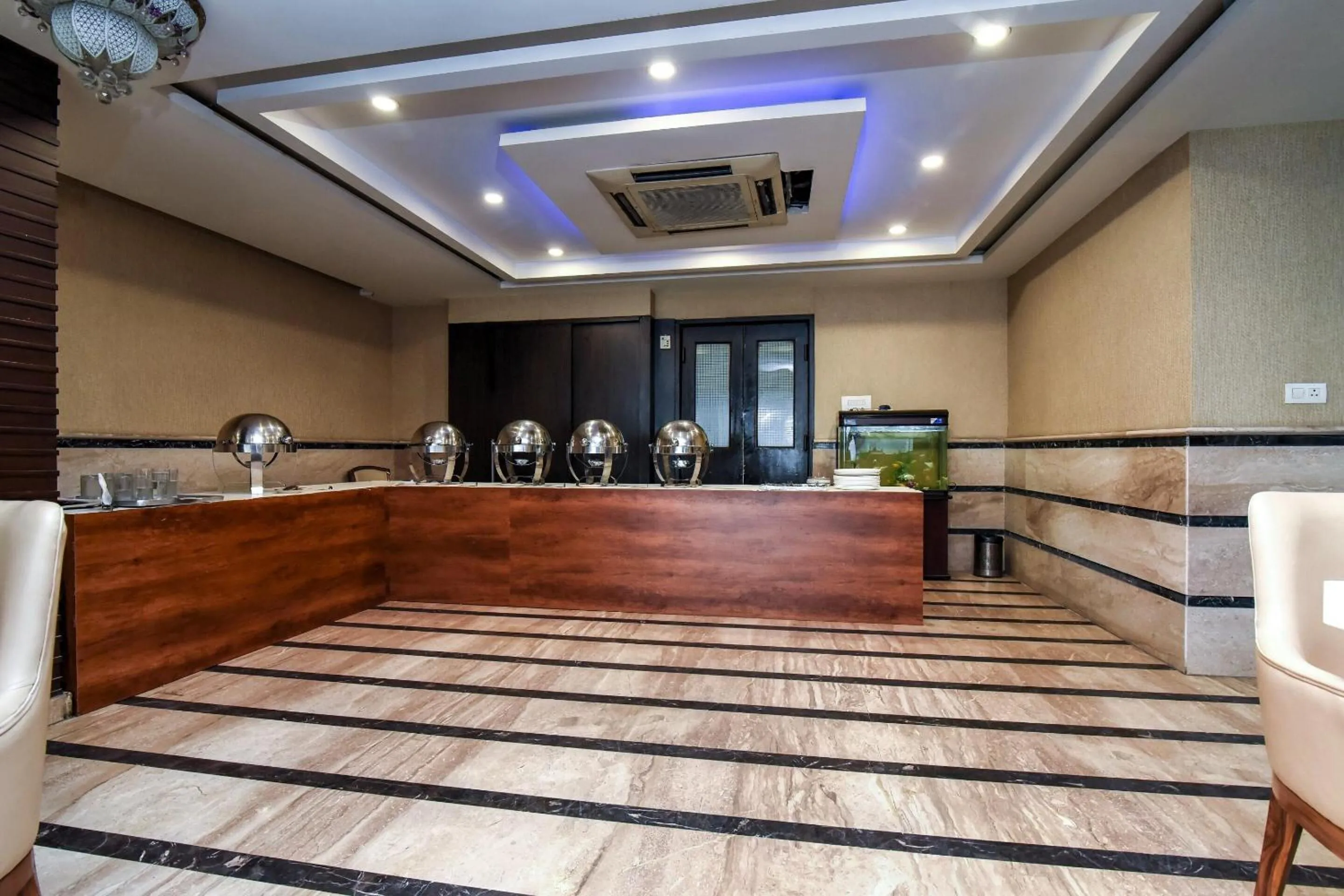 Lobby or reception in Capital O Corporate Inn