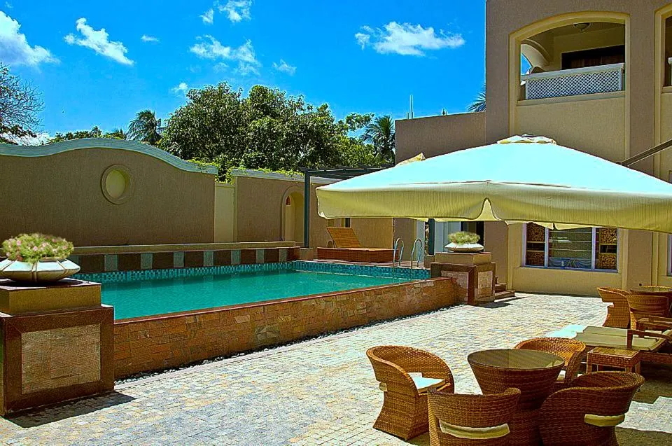 Swimming pool in Pramod Convention & Club Resort