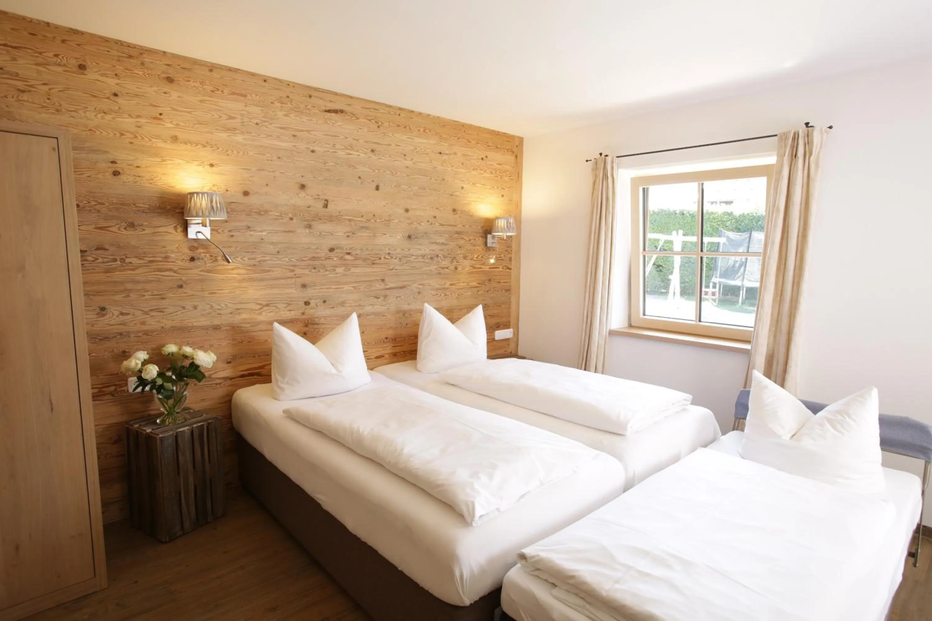 Photo of the whole room, Bed in Pension Schweizerhaus Garni