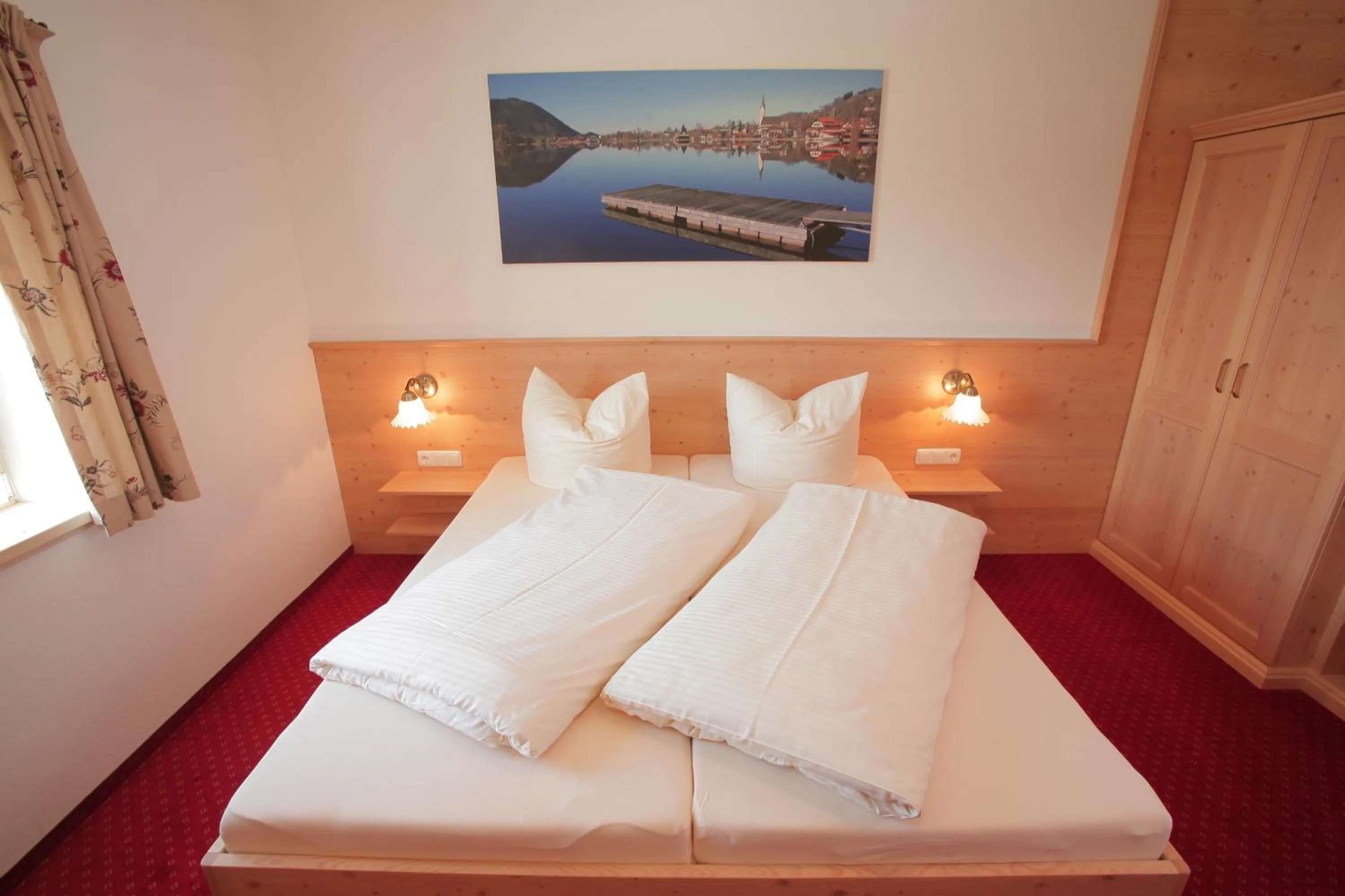 Bed in Pension Schweizerhaus Garni