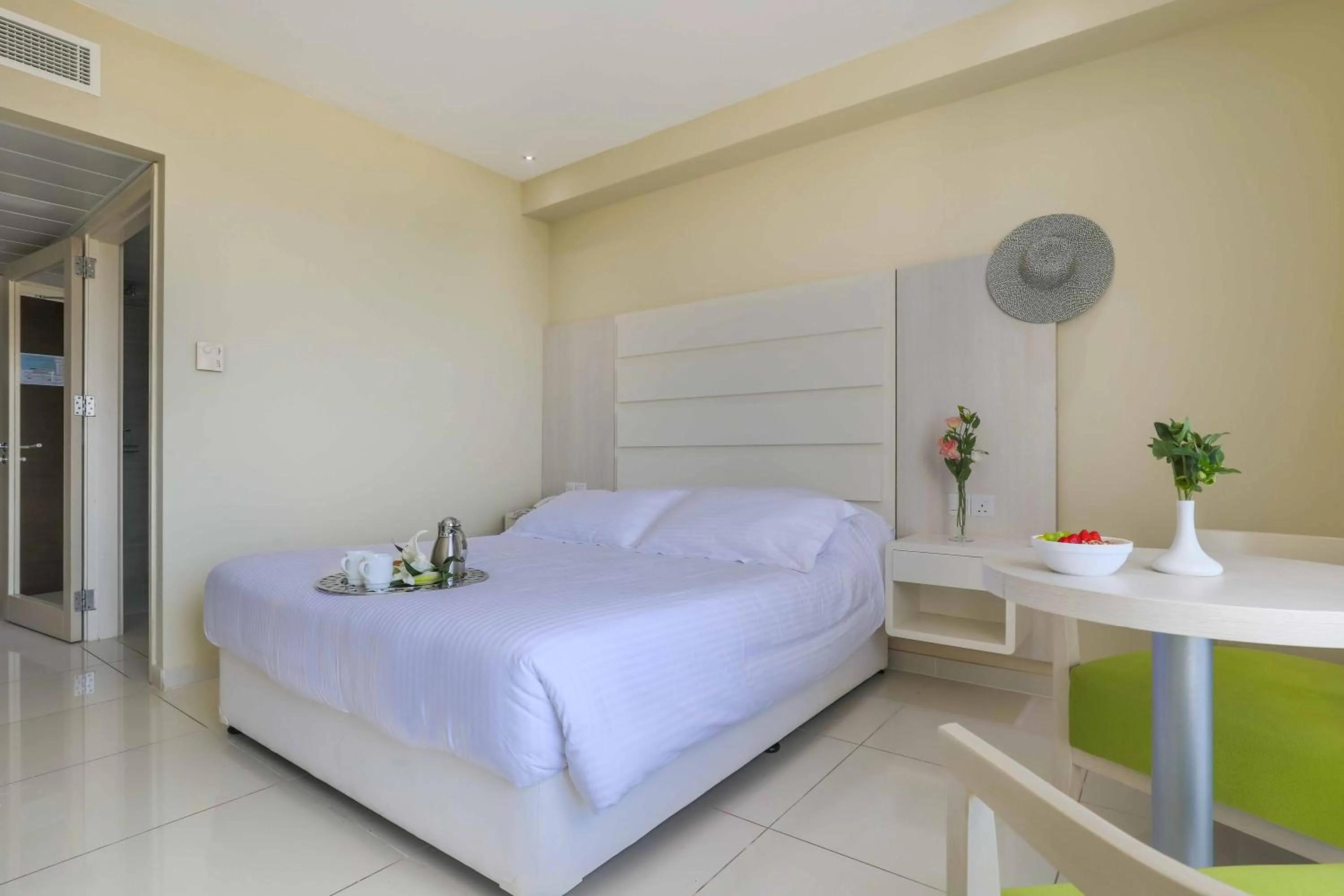 Bed in Tasia Maris Beach Hotel - Adults Only