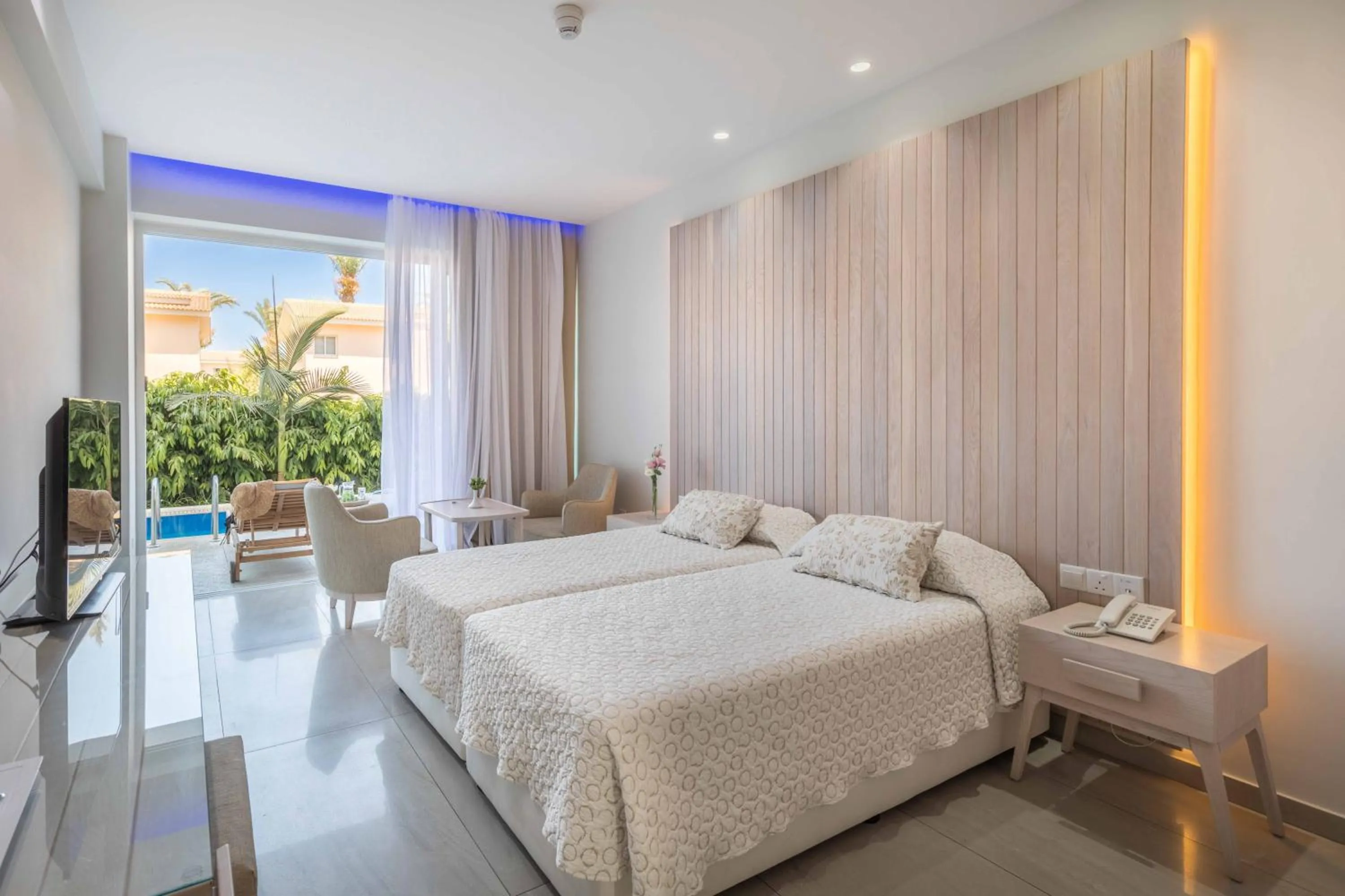 Bedroom, Bed in Tasia Maris Beach Hotel - Adults Only