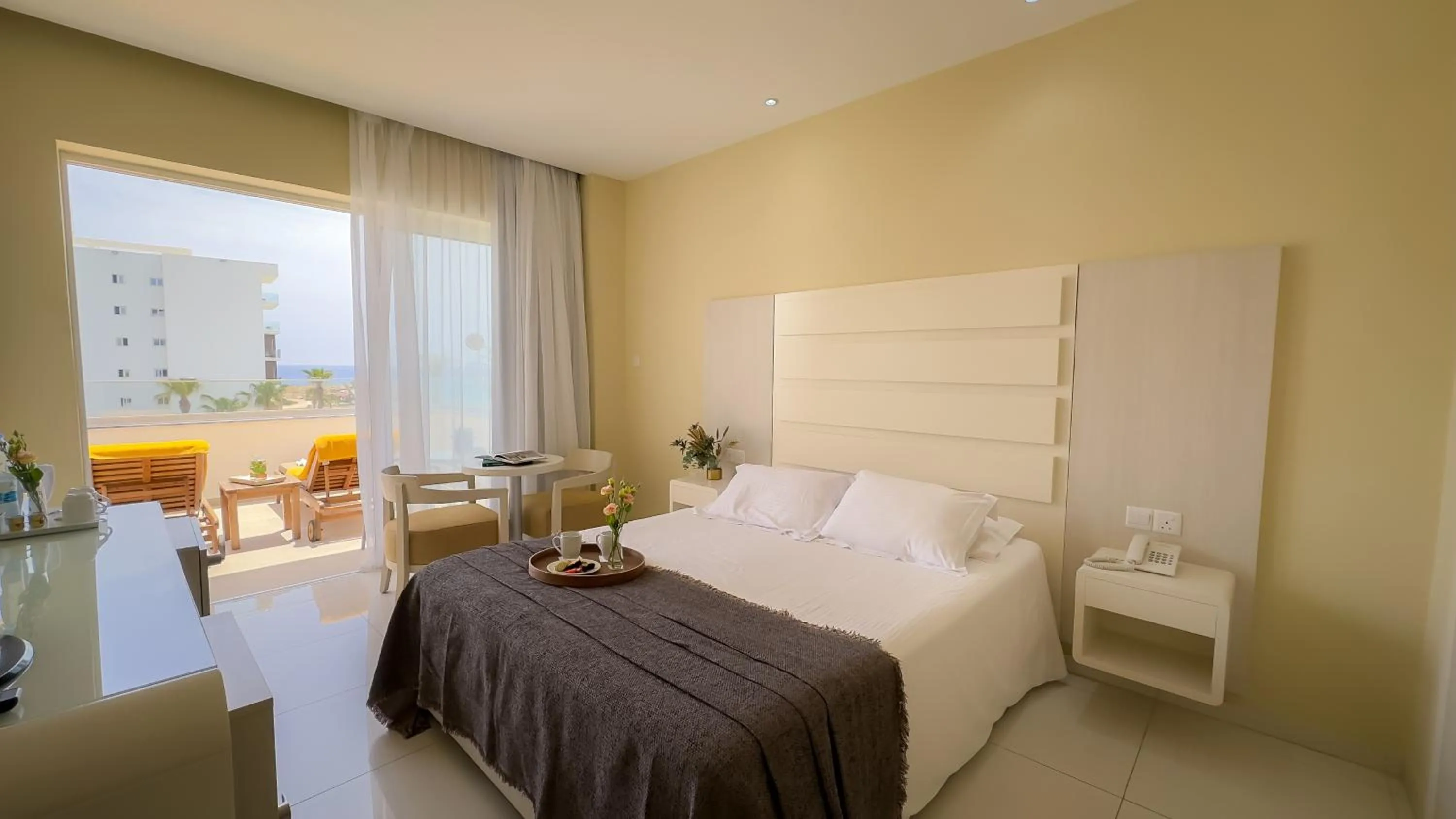 Bed in Tasia Maris Beach Hotel - Adults Only