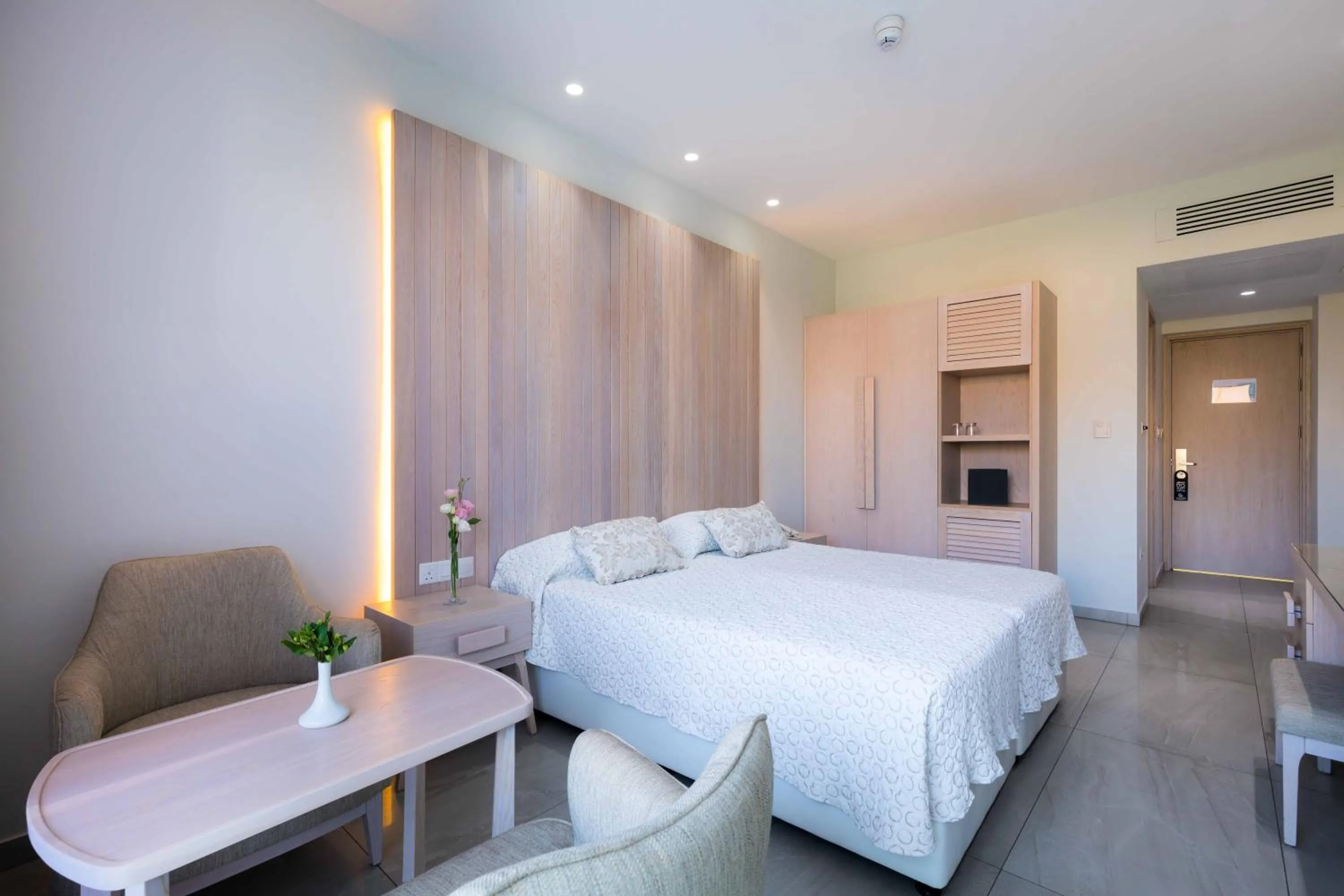 Bed in Tasia Maris Beach Hotel - Adults Only