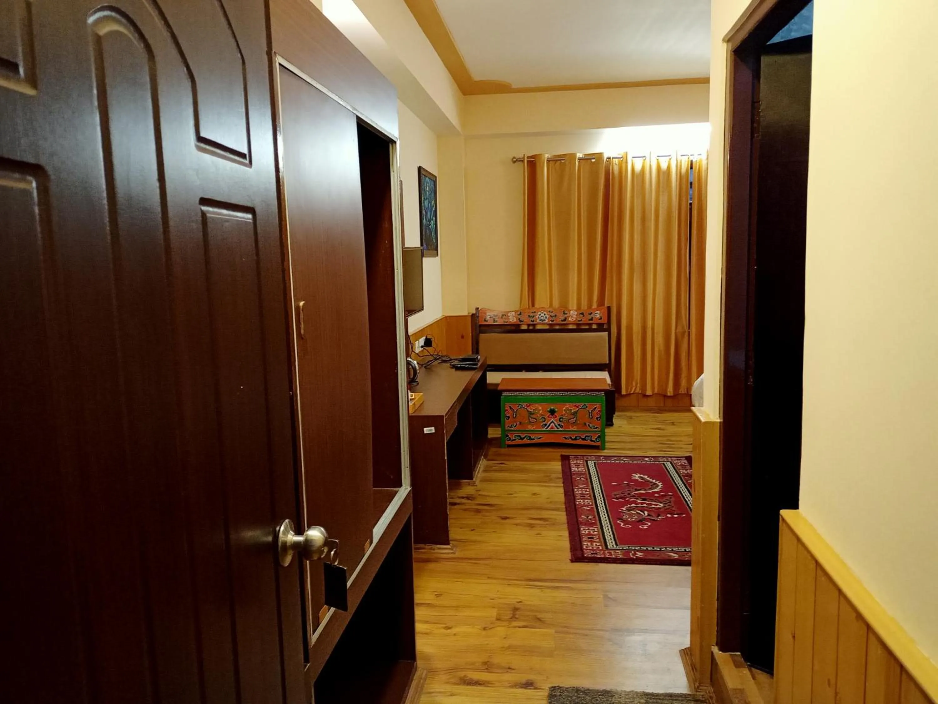 Seating area, Bed in Le Coxy Resort Lachung