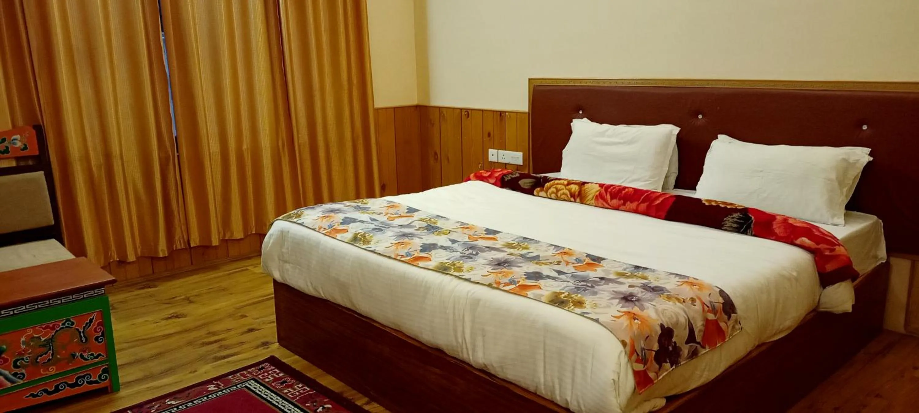 Bed in Le Coxy Resort Lachung