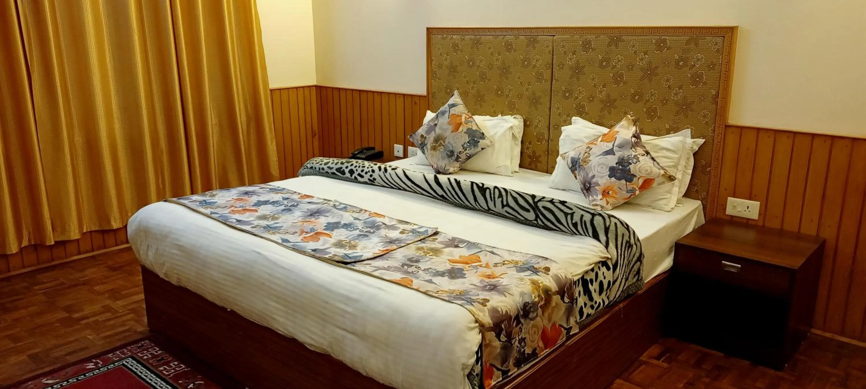 Bed in Le Coxy Resort Lachung