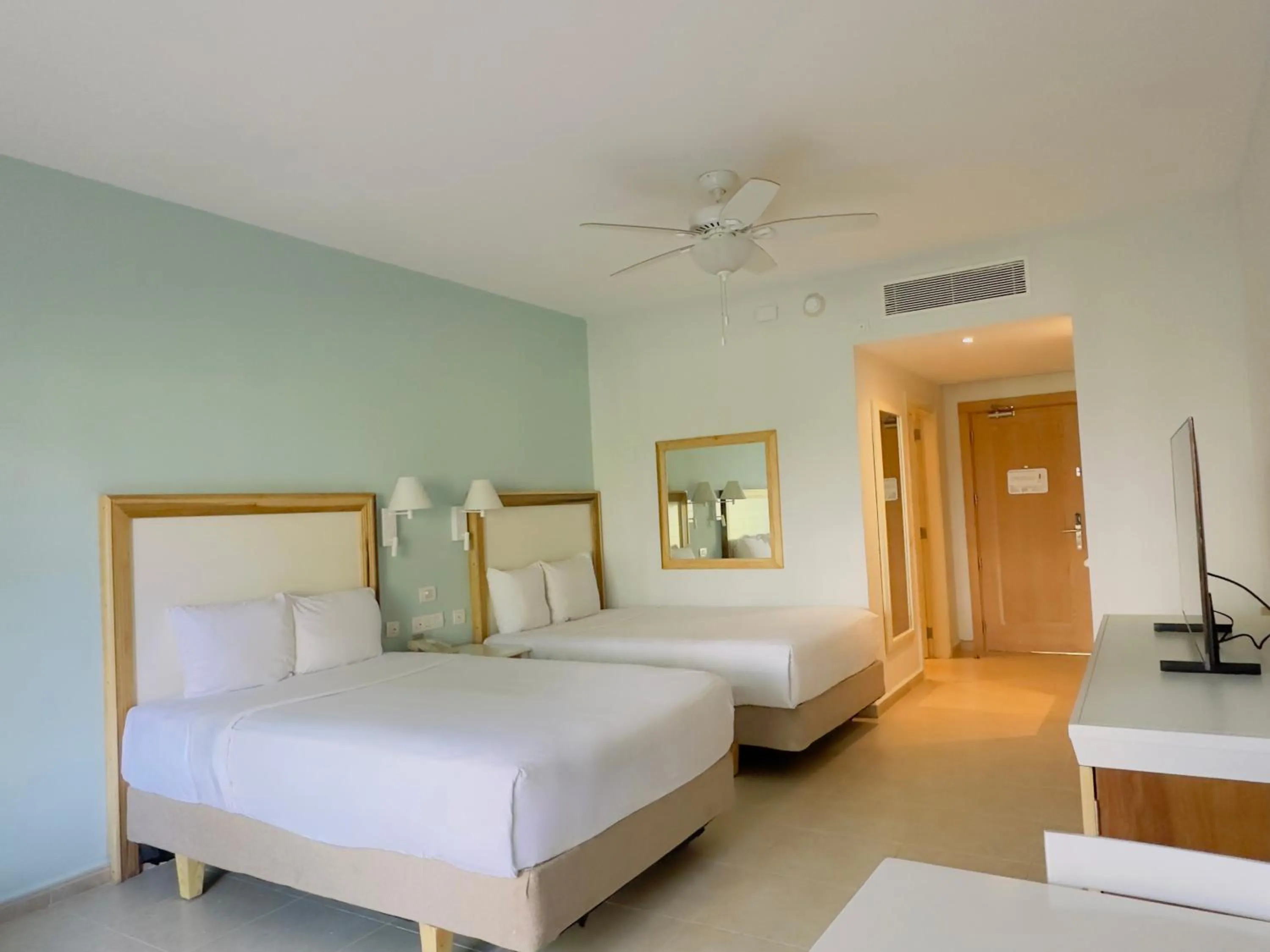 Photo of the whole room, Bed in Iberostar Waves Punta Cana - All Inclusive