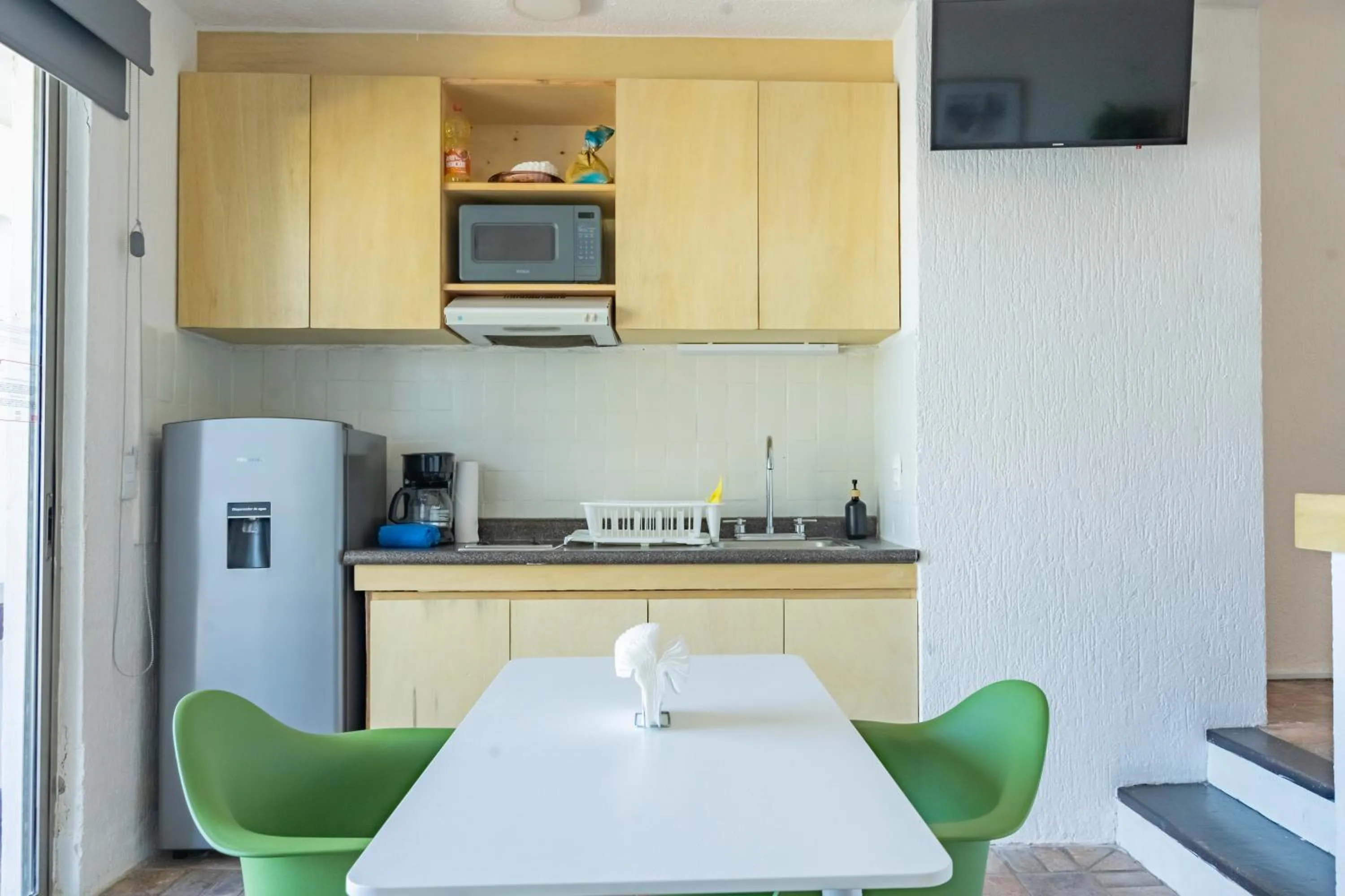 Dining area in All Ritmo by Andiani Travel