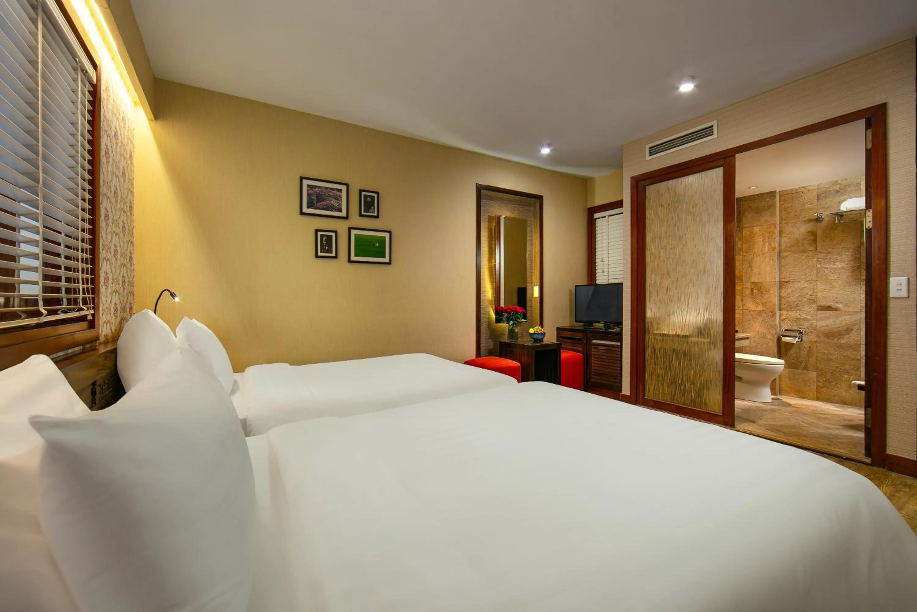 Bed in Oriental Suites Hotel & Spa