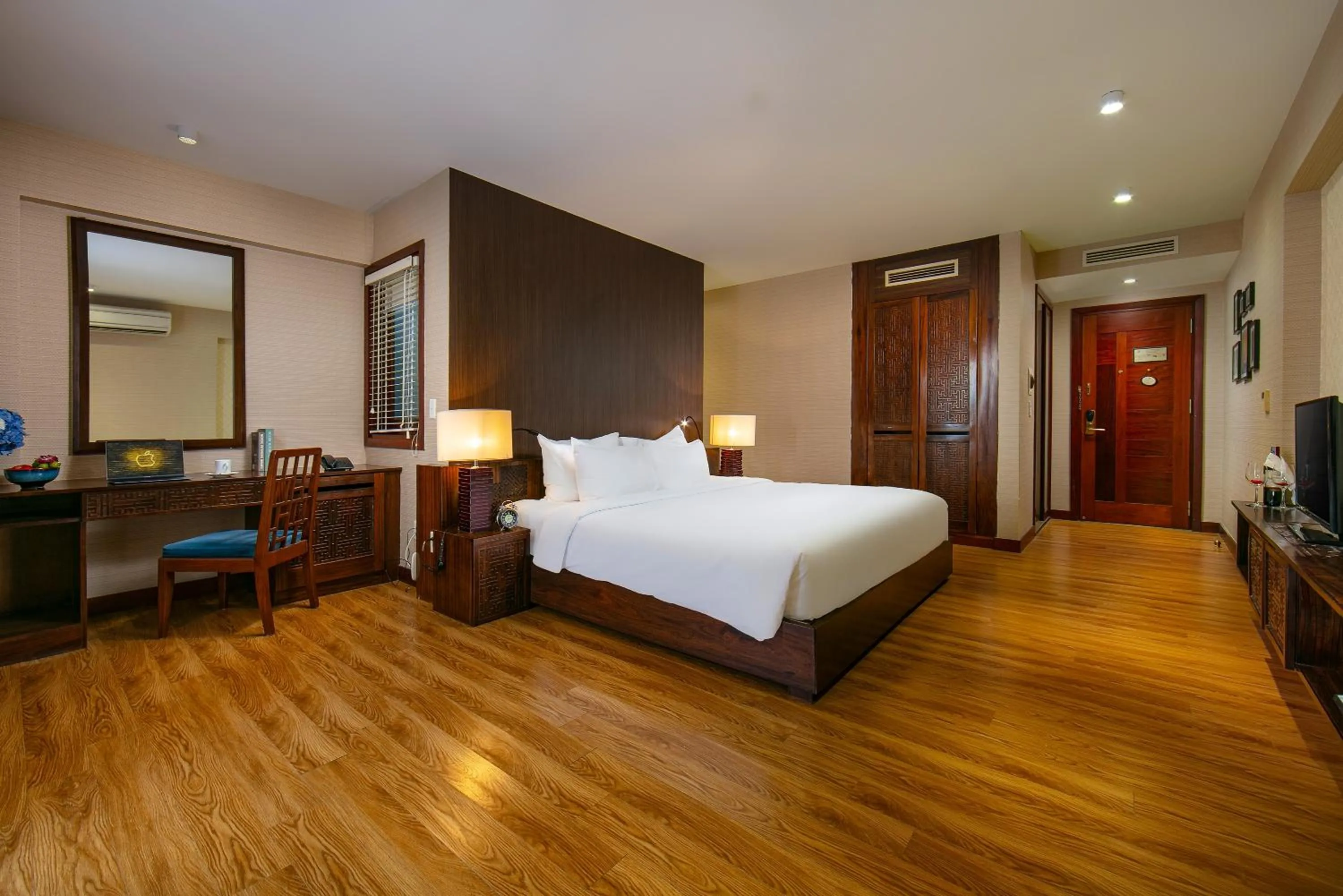 Bed in Oriental Suites Hotel & Spa