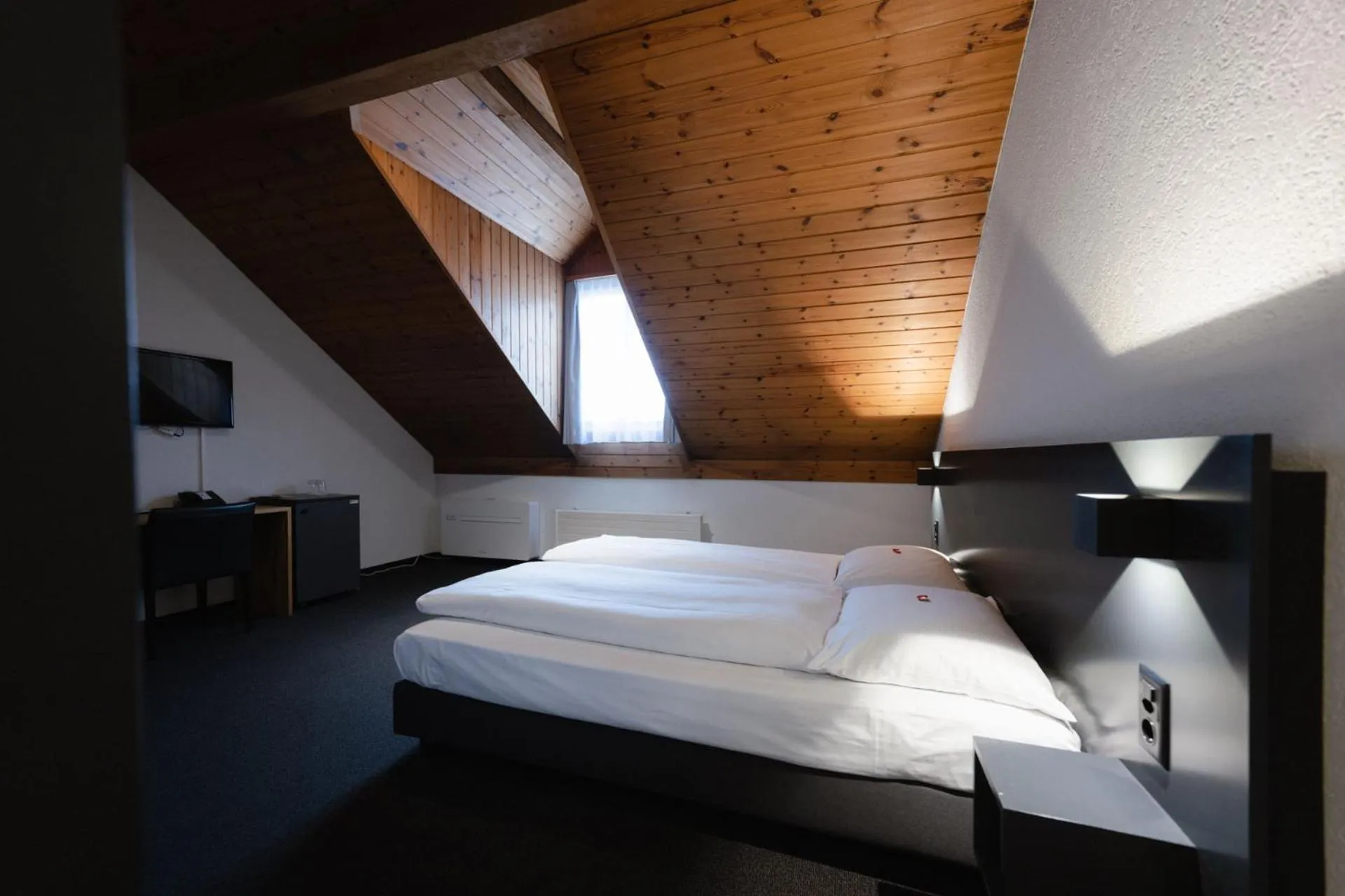 Bedroom, Bed in HotelChur.ch