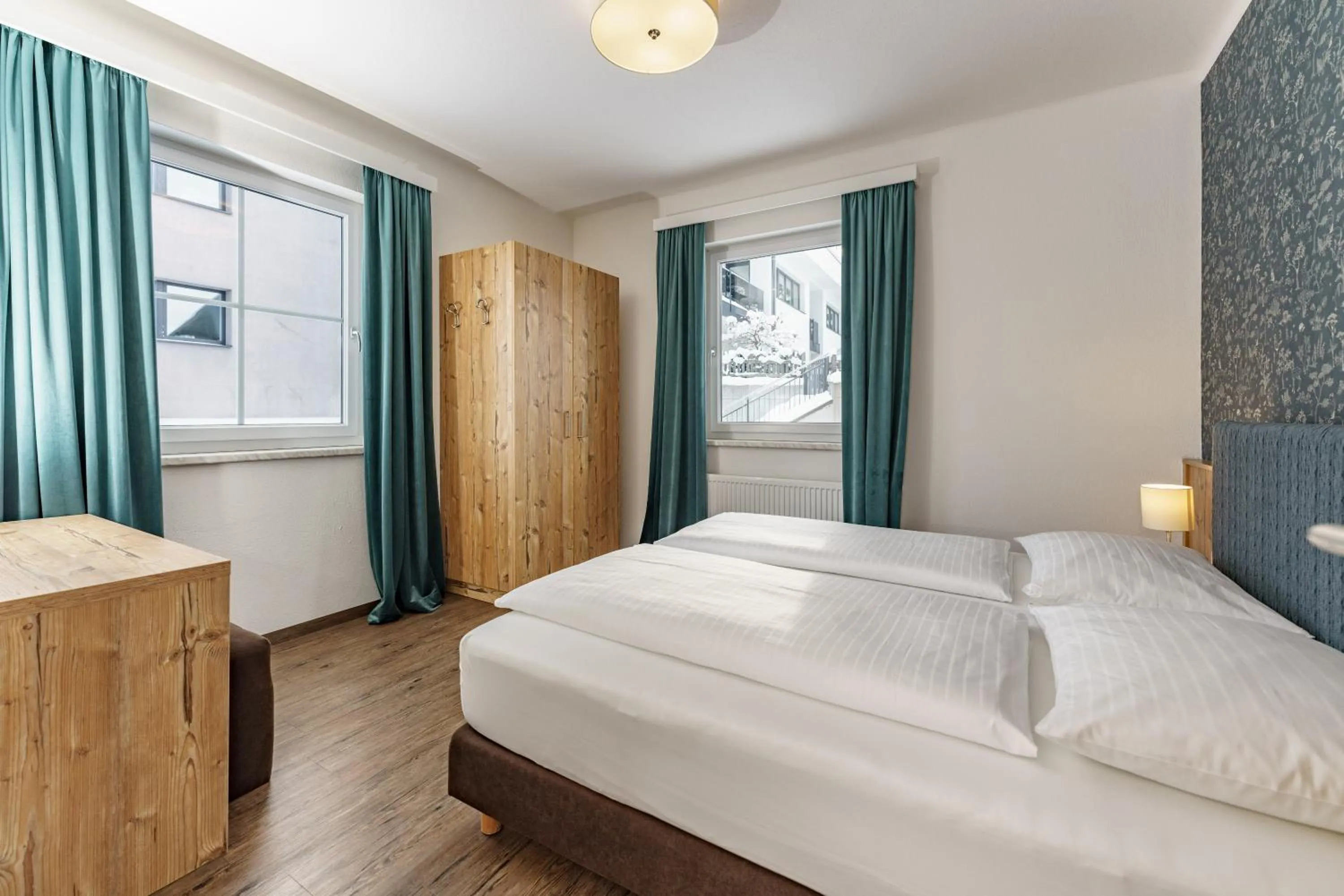 Bedroom, Bed in Appartements Landhaus Hubertus Wellness & Breakfast