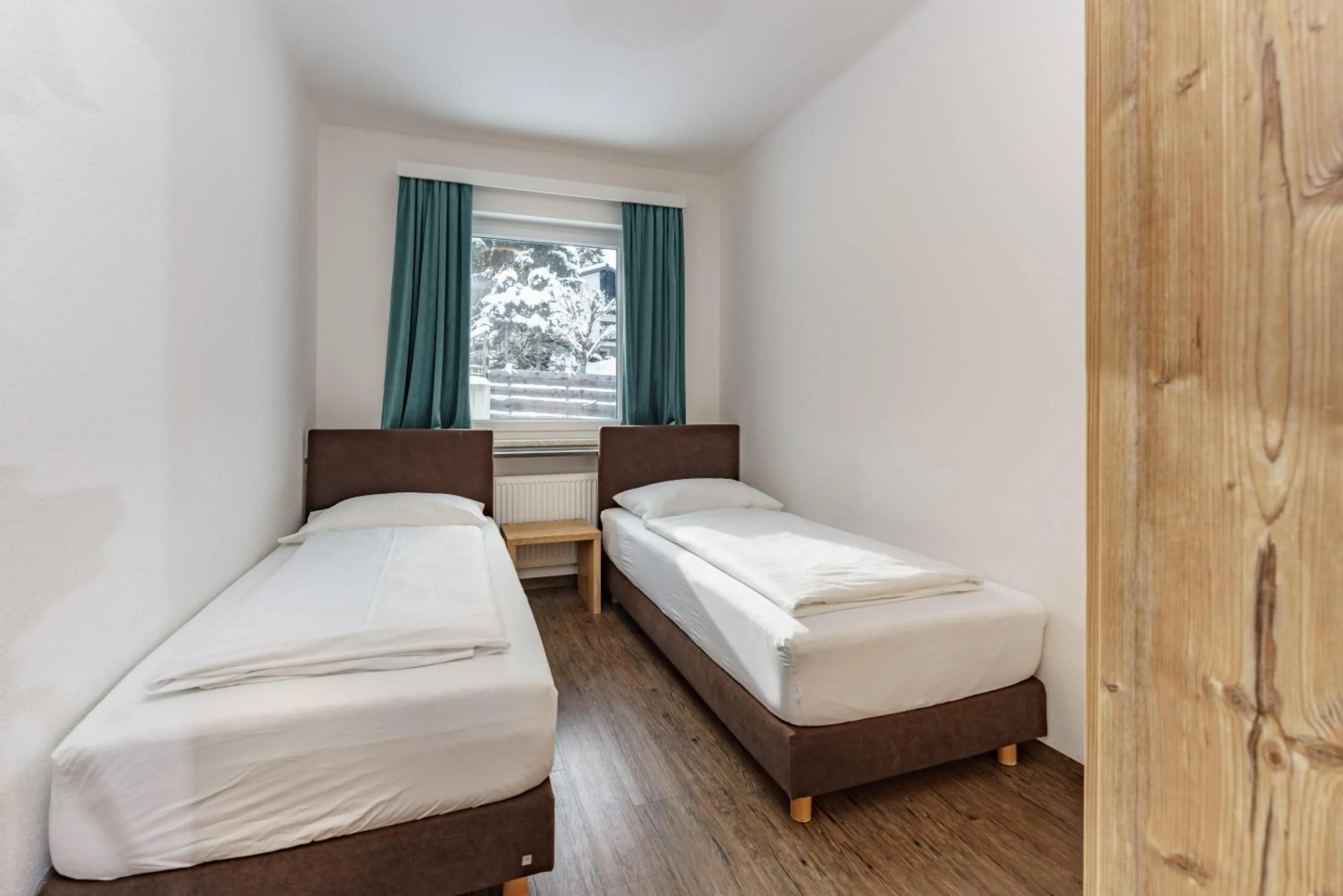 Bedroom, Bed in Appartements Landhaus Hubertus Wellness & Breakfast