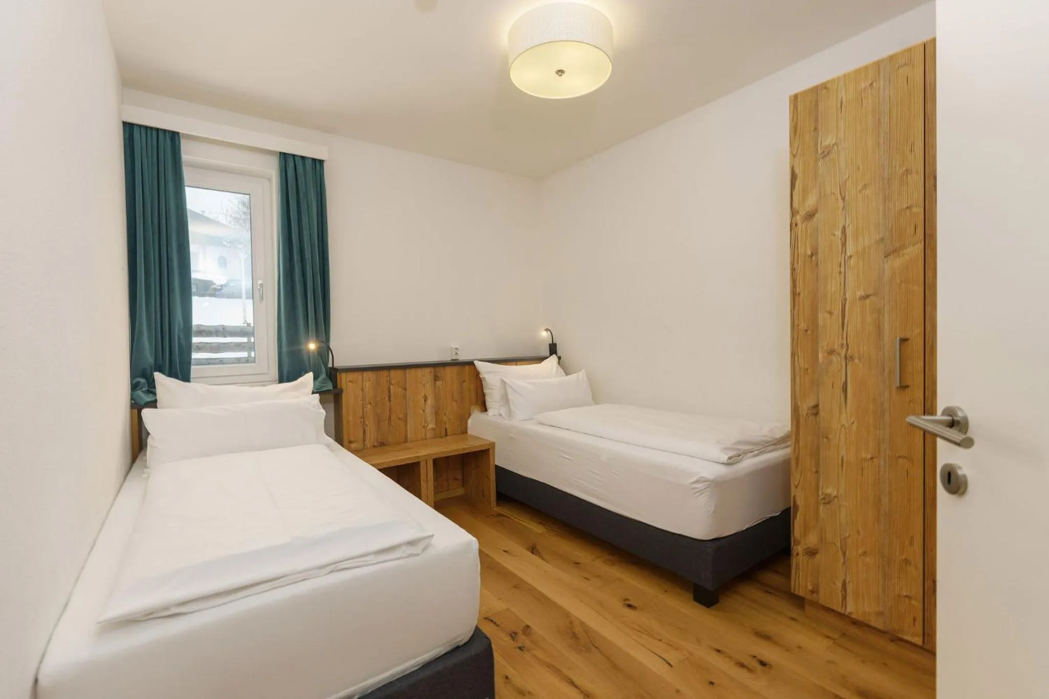 Bed in Appartements Landhaus Hubertus Wellness & Breakfast