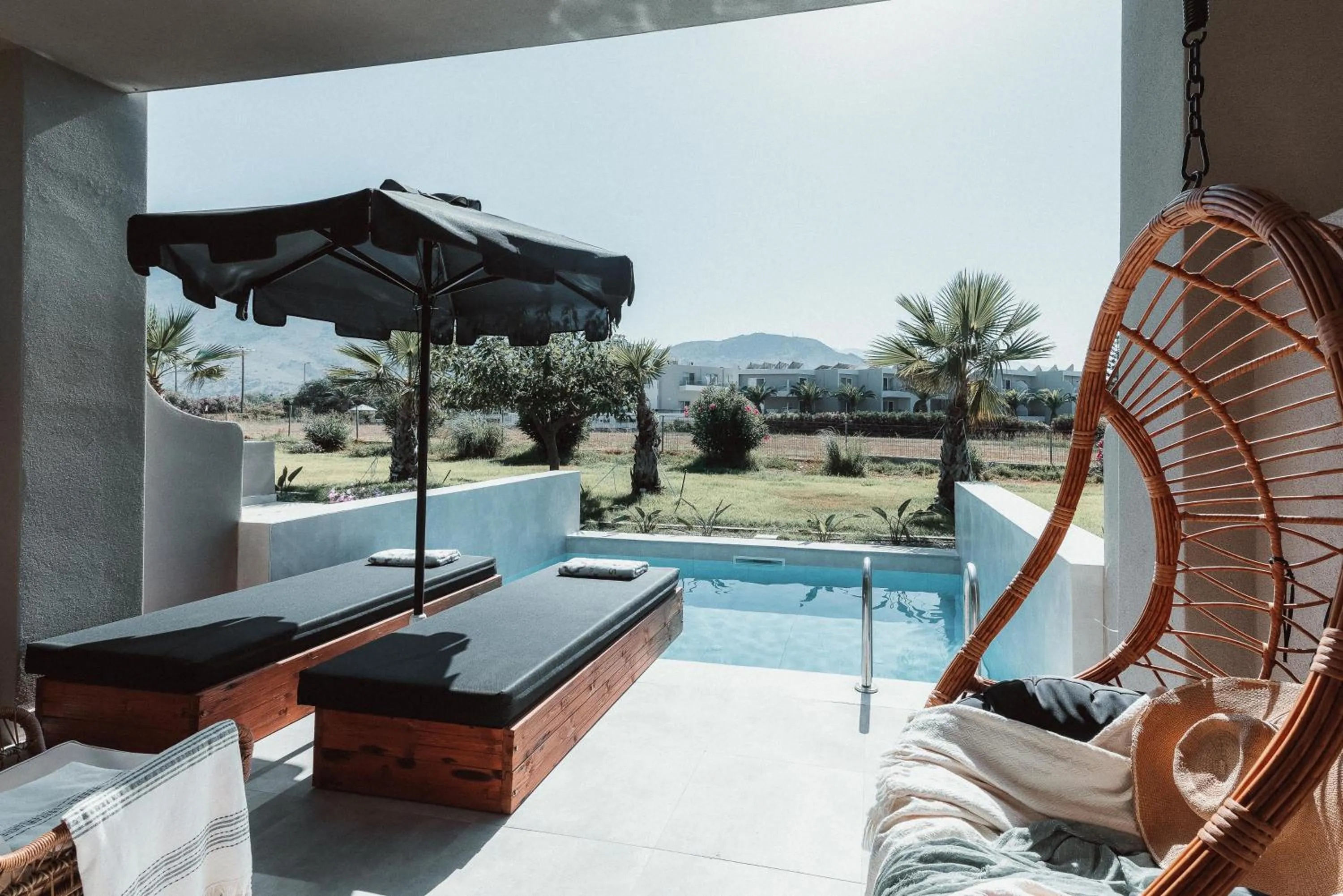 Swimming pool in Eliros Mare Beachfront Poem Hotel