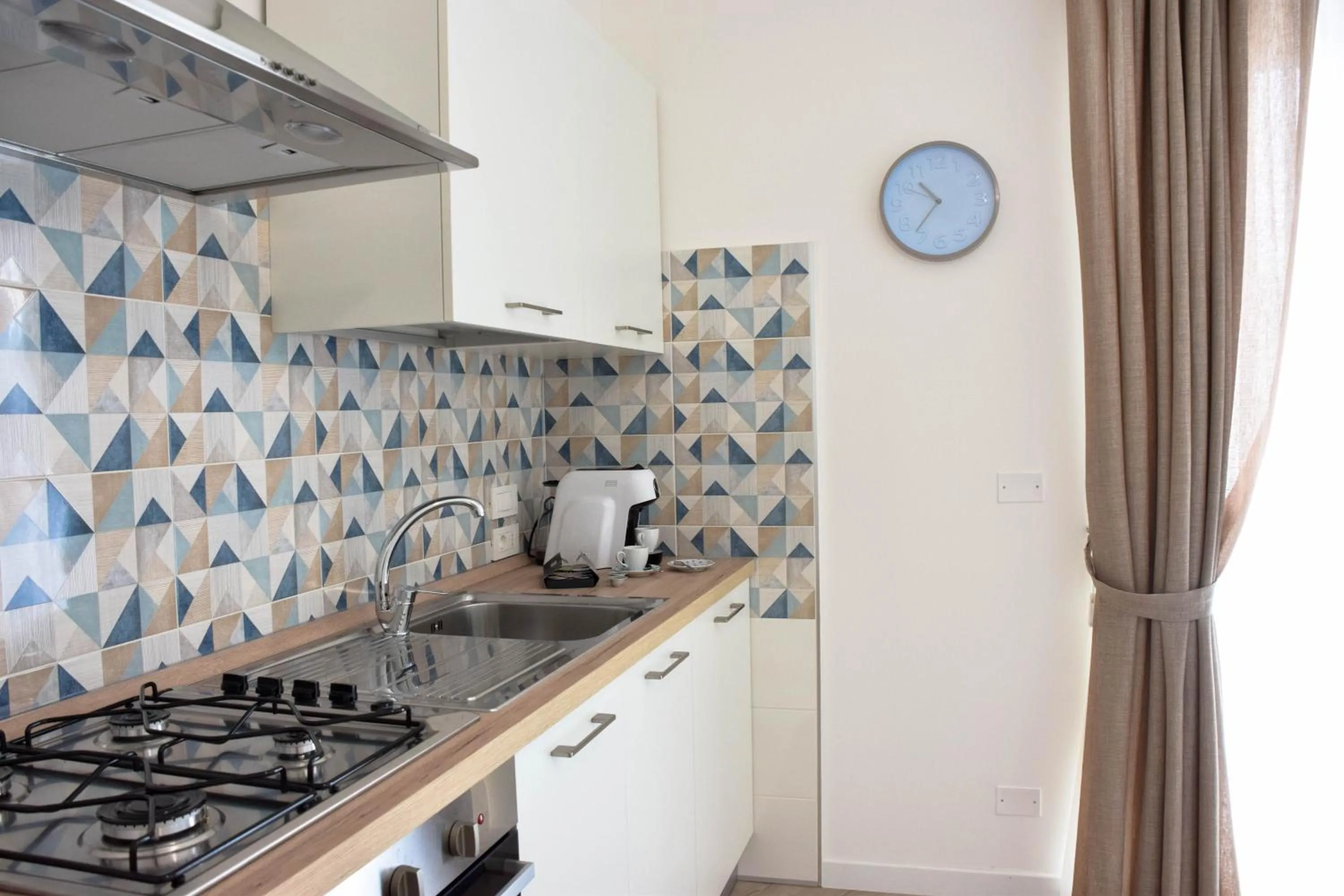 Kitchen or kitchenette in Accòmodati - Camere e Appartamenti