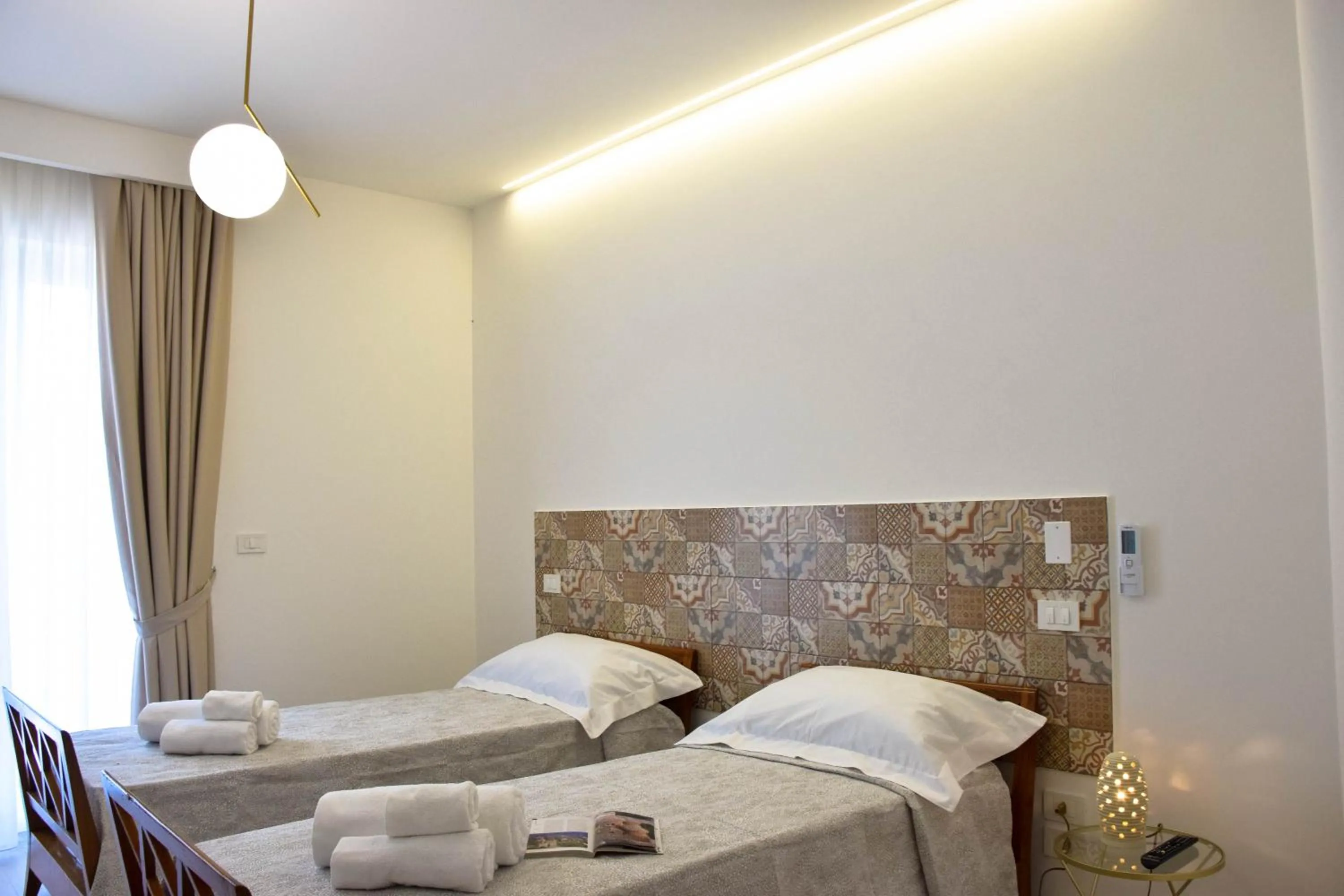 Bed in Accòmodati - Camere e Appartamenti