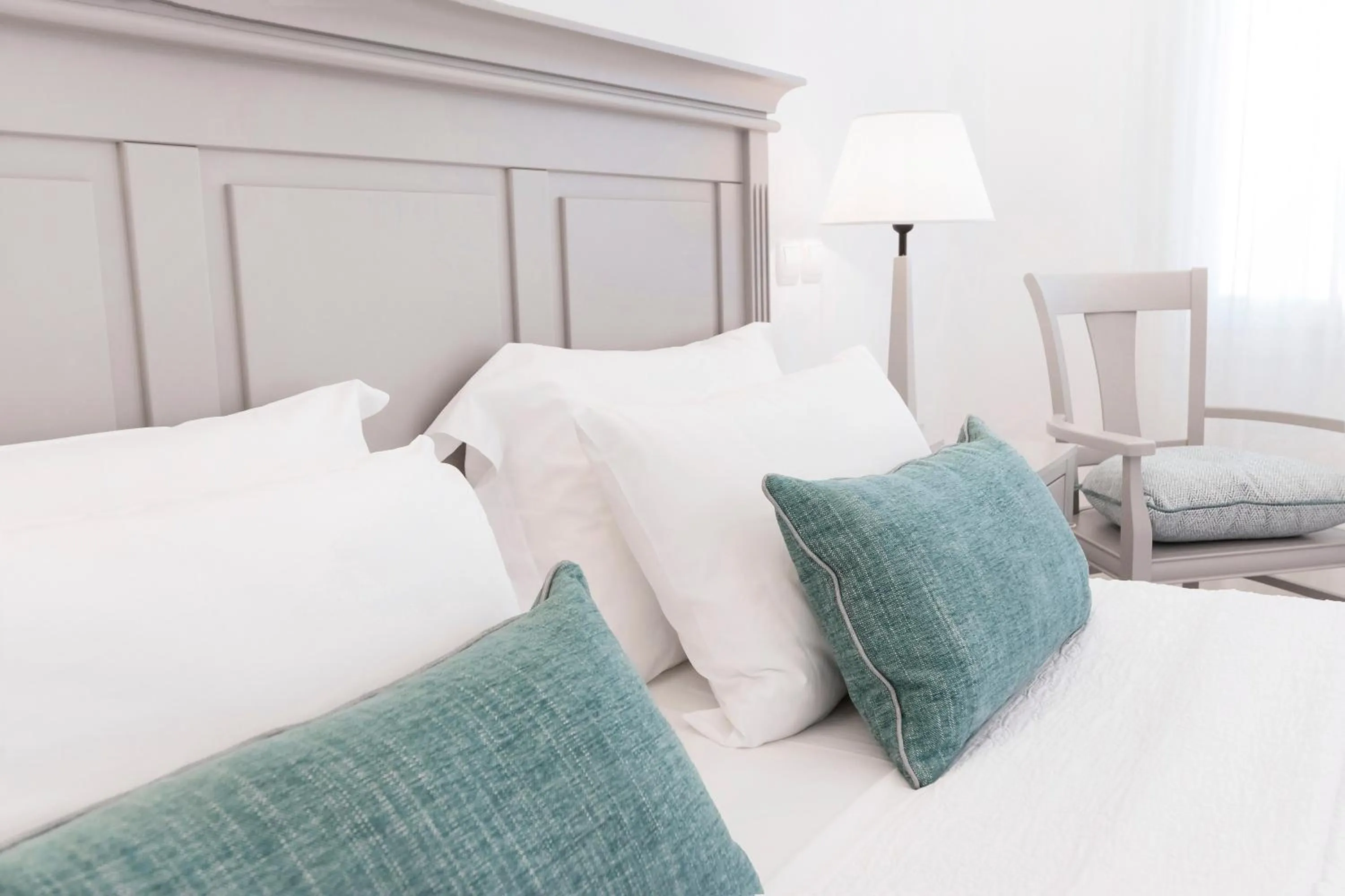 Bed in Stelia Mare Boutique Hotel